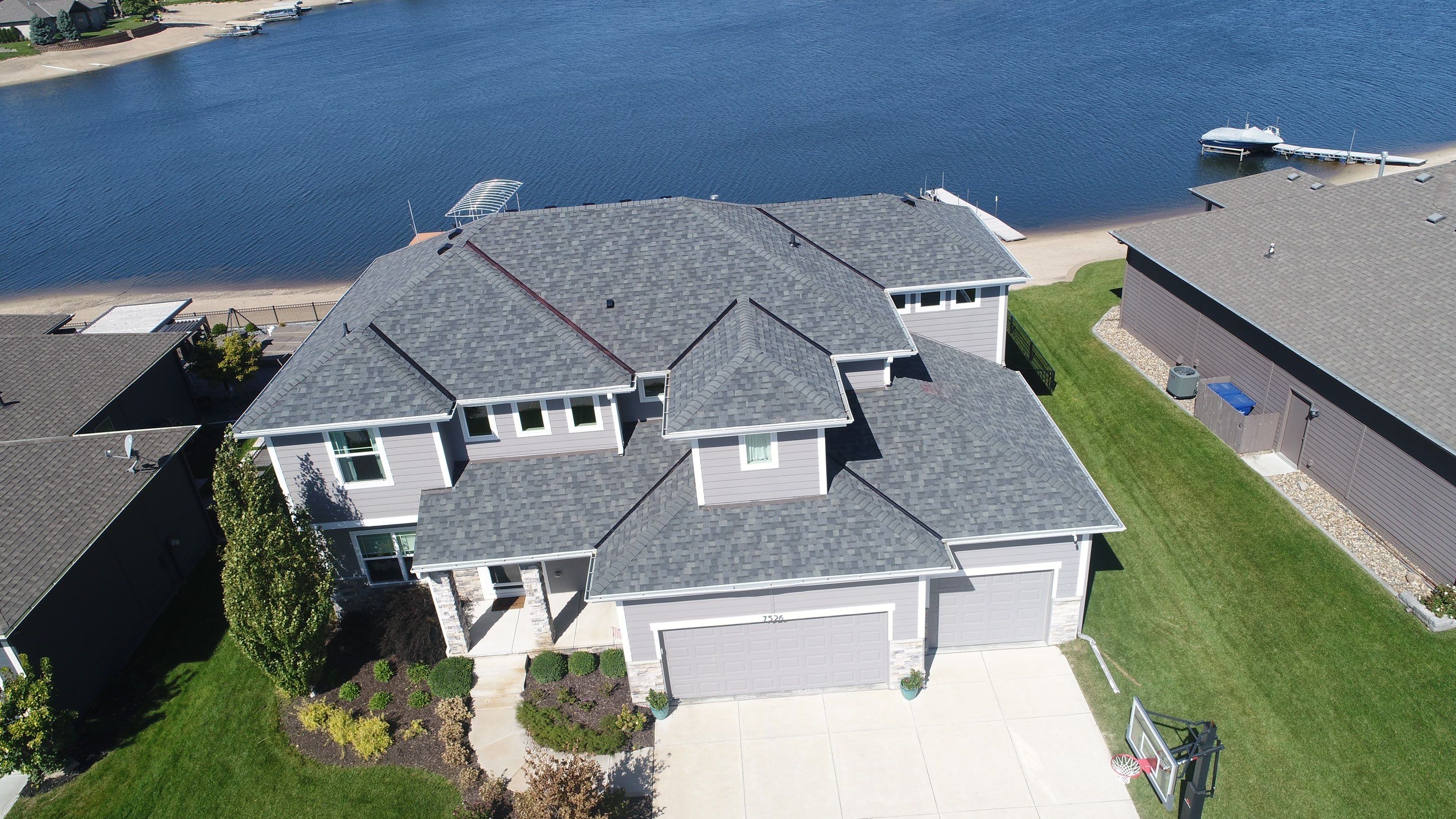 Residential Roofing Installation using Asphalt Shingles by Lightning Exteriors