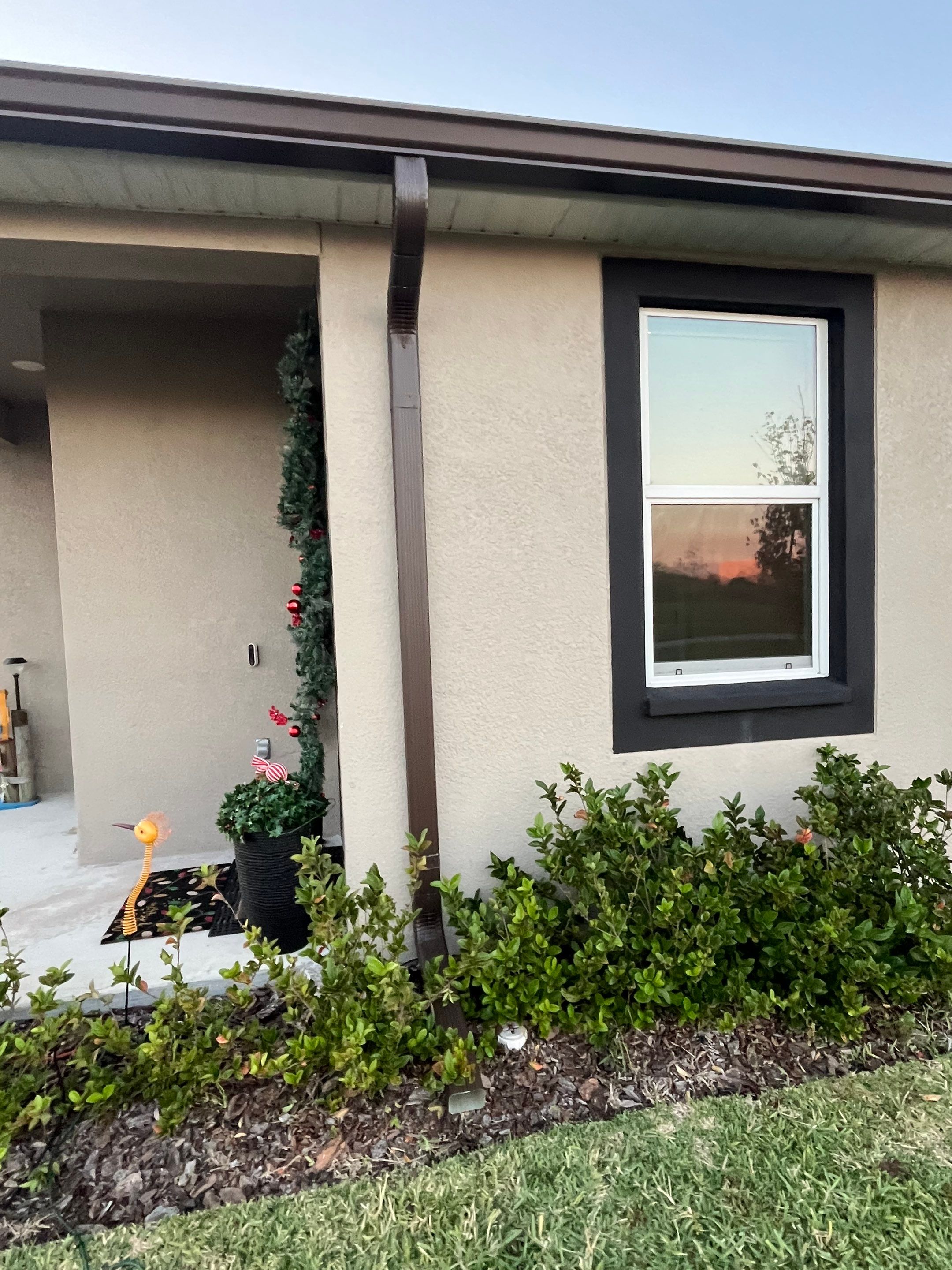 3X4 elbow Downspouts using Musket Brown Seamless Gutters in Lakeland FL by Gutter Professors