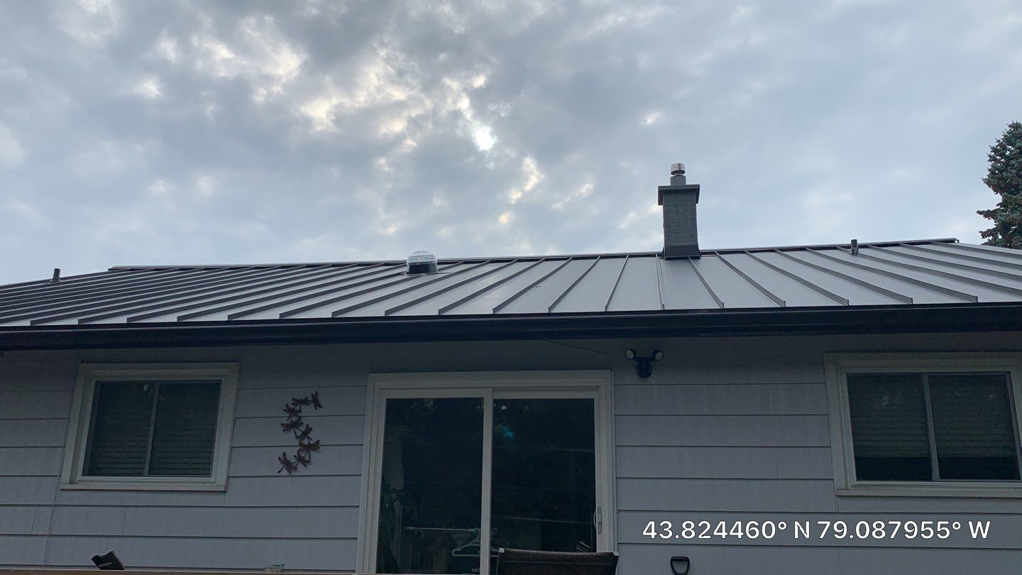 Residential Roofing Installation using 16" Standing Seam Panels by Jay Carter Roofing & Sheet Metal