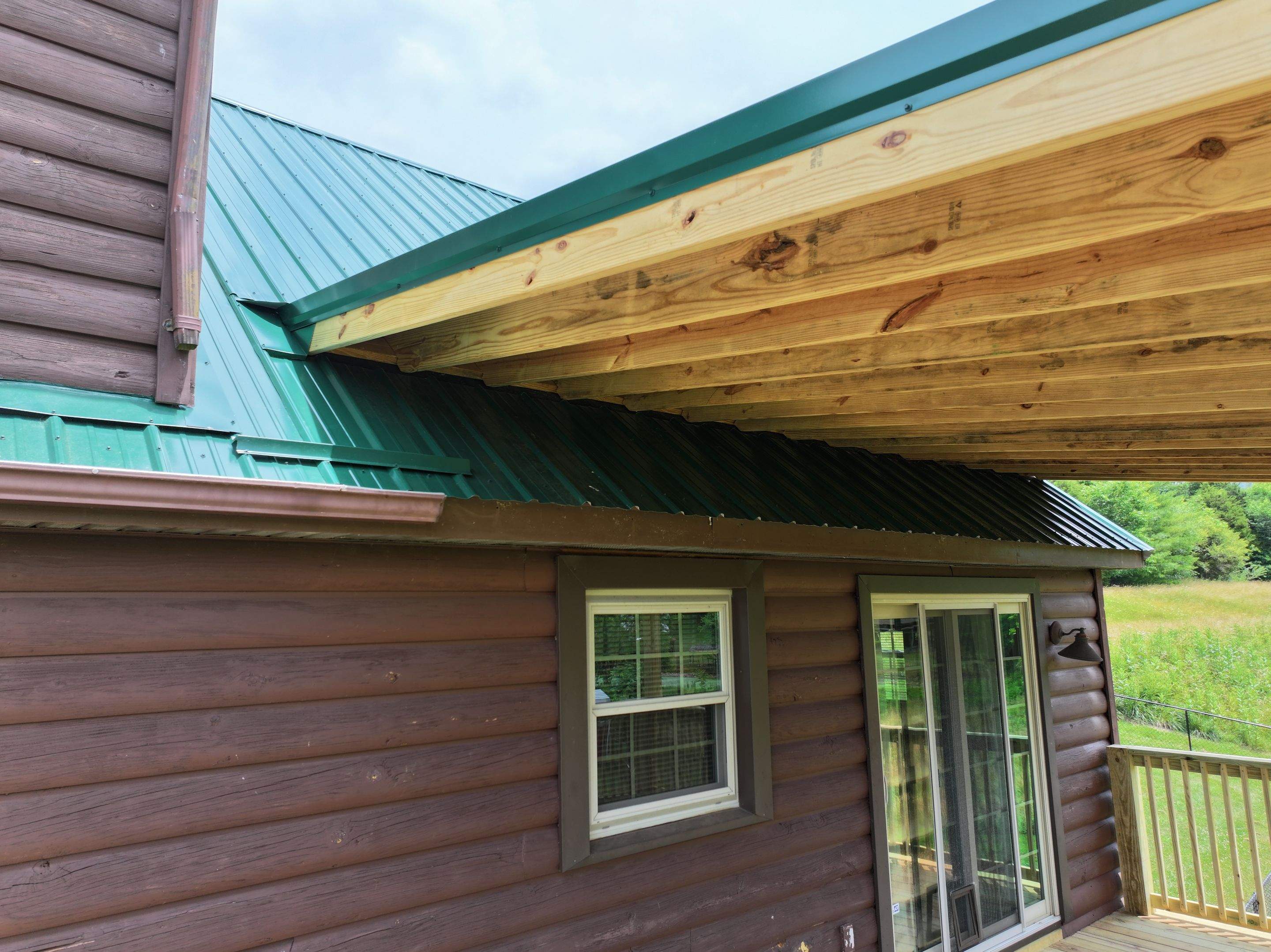 Paddle Creek Pet Ranch Cabin  by Omnia Roofing