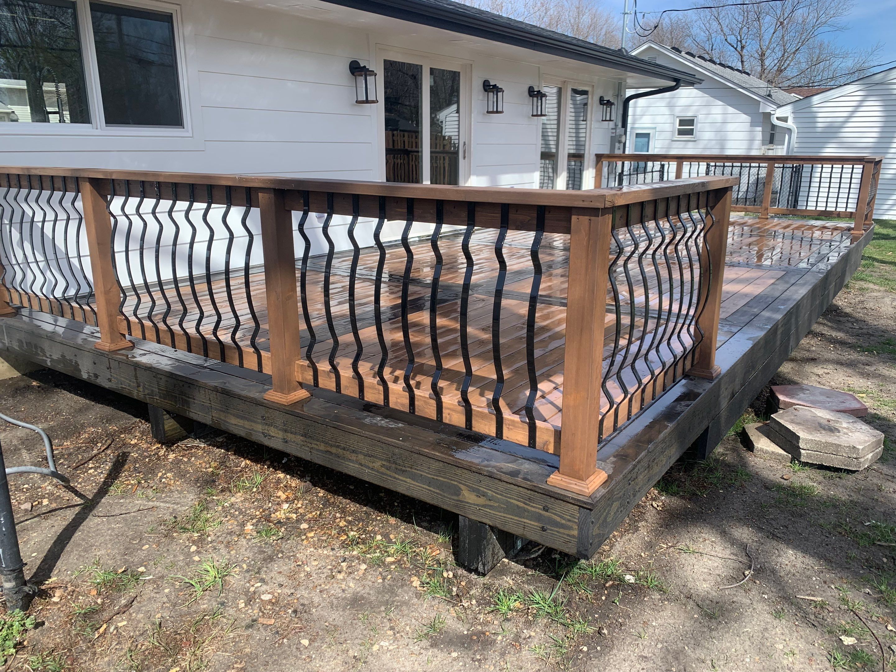 Deck re stained  by Cutting edge painting 