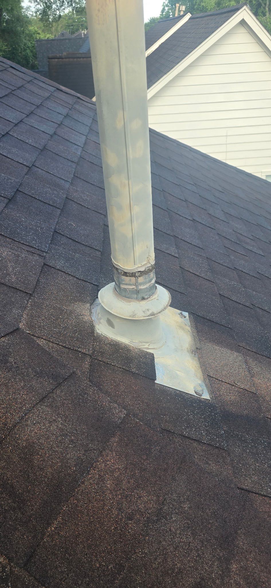 Water Heater Vent Collar Reseal by Black Coast Roofing