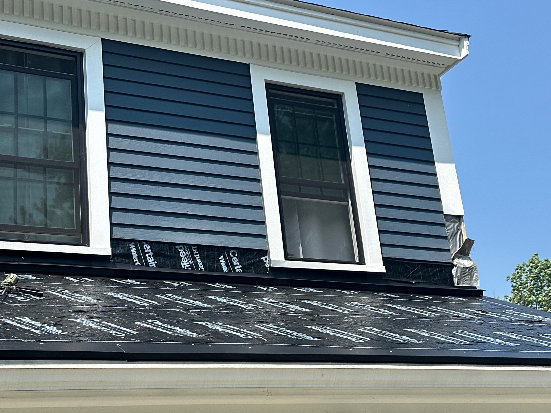 Roof Replacement in Amesbury, MA by Mighty Dog Roofing of Greater Middlesex County