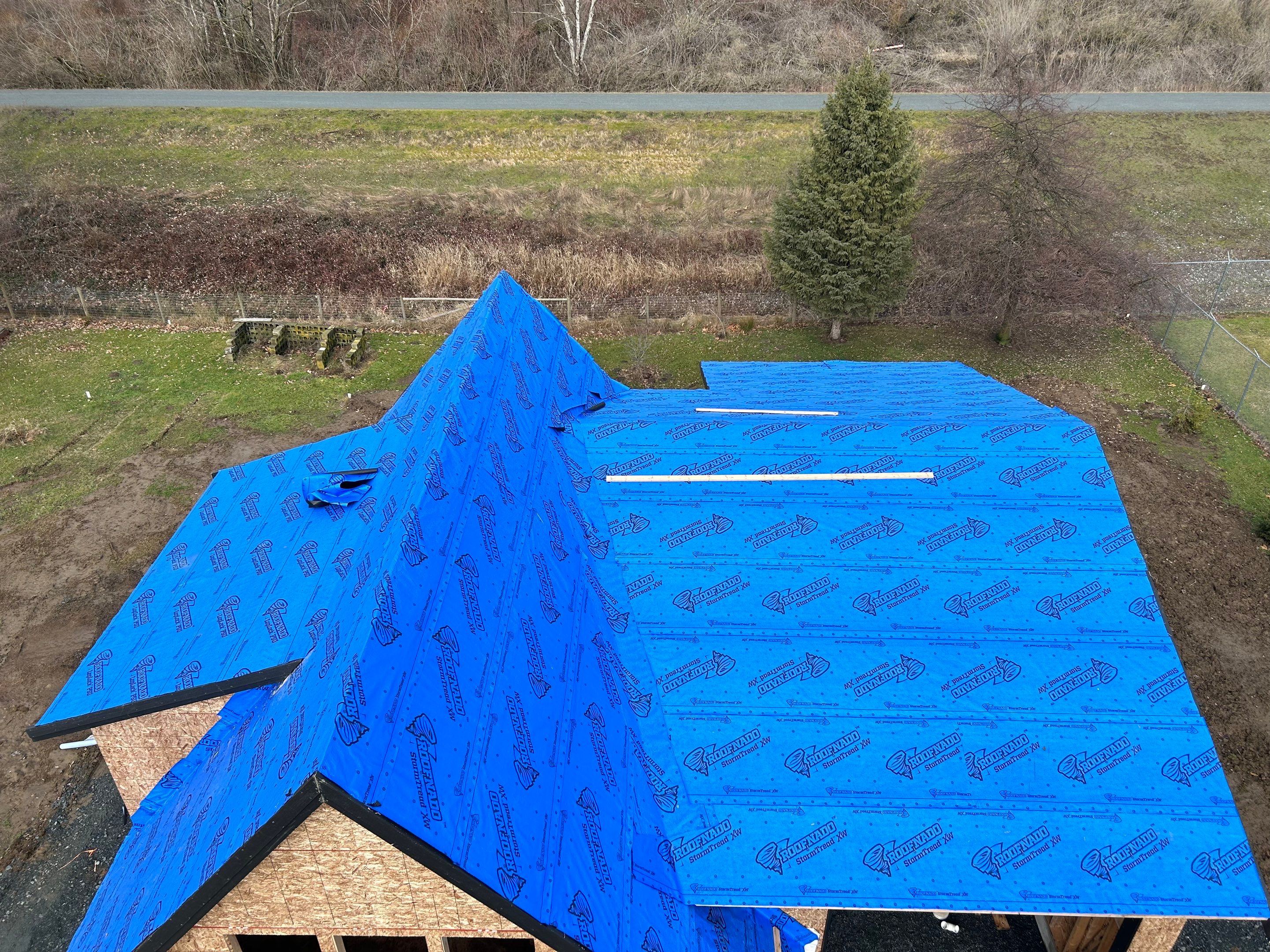 Residential Roofing Installation using Malarky Vista Shingles and Prolok Metal  by Top Notch Roofing Inc