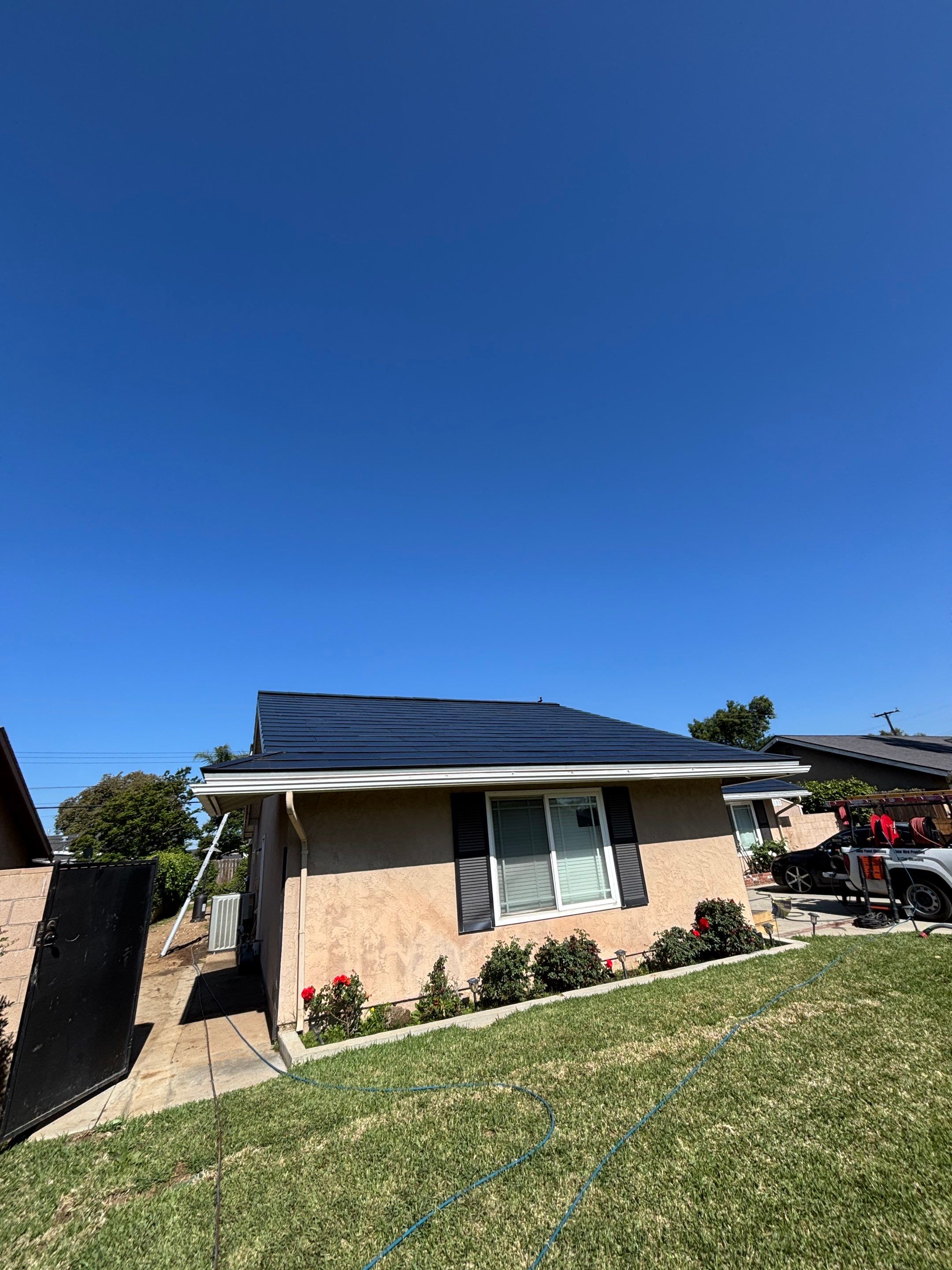 Tesla Roof Cleaning in La Verne Ca by Palm Coast Solar Cleaning