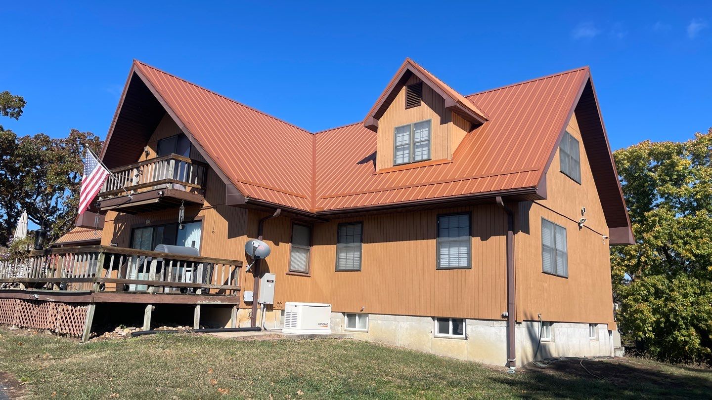 Residential Roofing & Snowguard Install - 29 Gauge G-Rib Metal - Color Copper Metallic  by Titan Commercial & Residential Roofing 