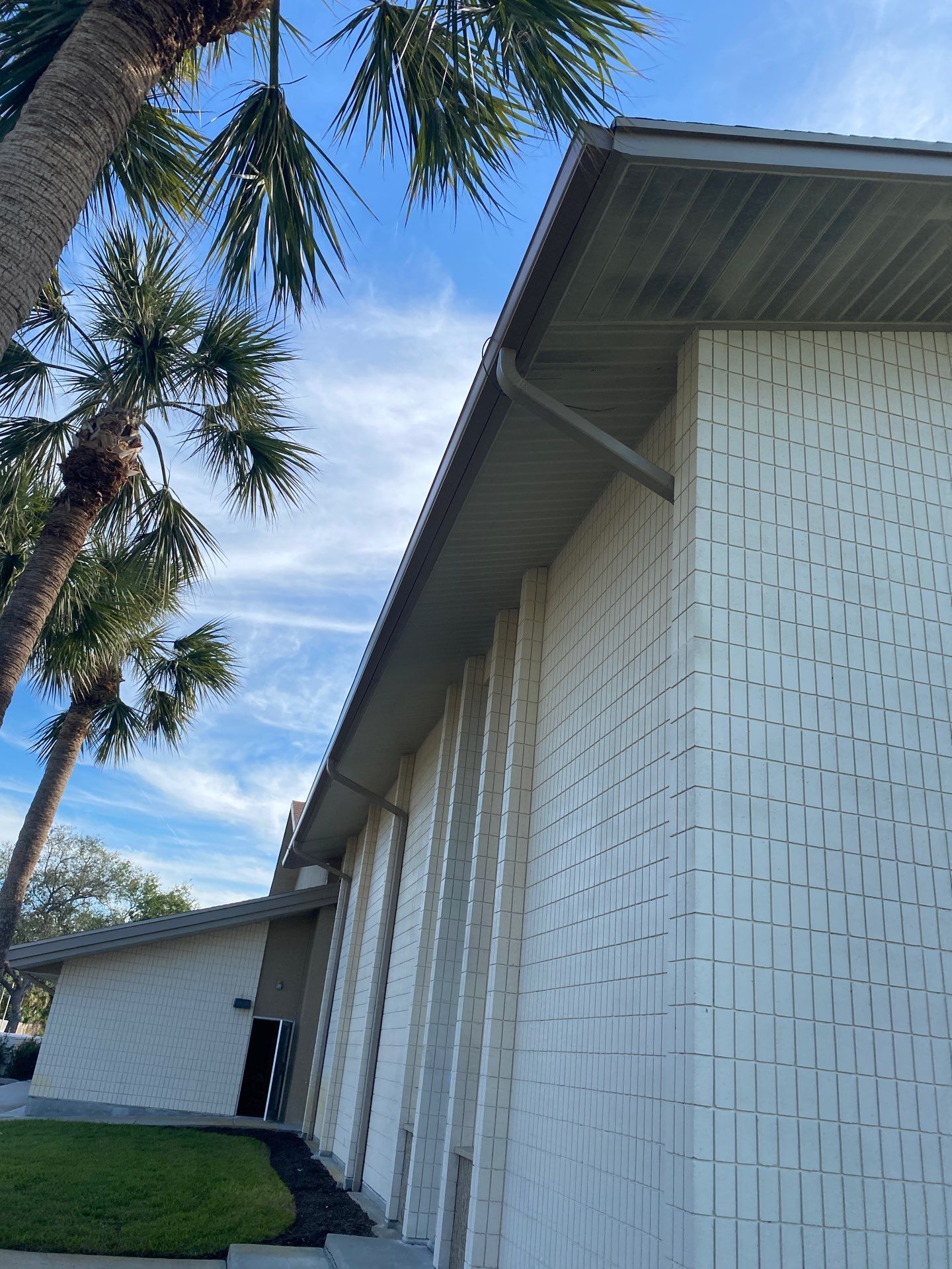 Grey Aluminum Gutters with Downspouts in Sarasota FL by Gutter Professors