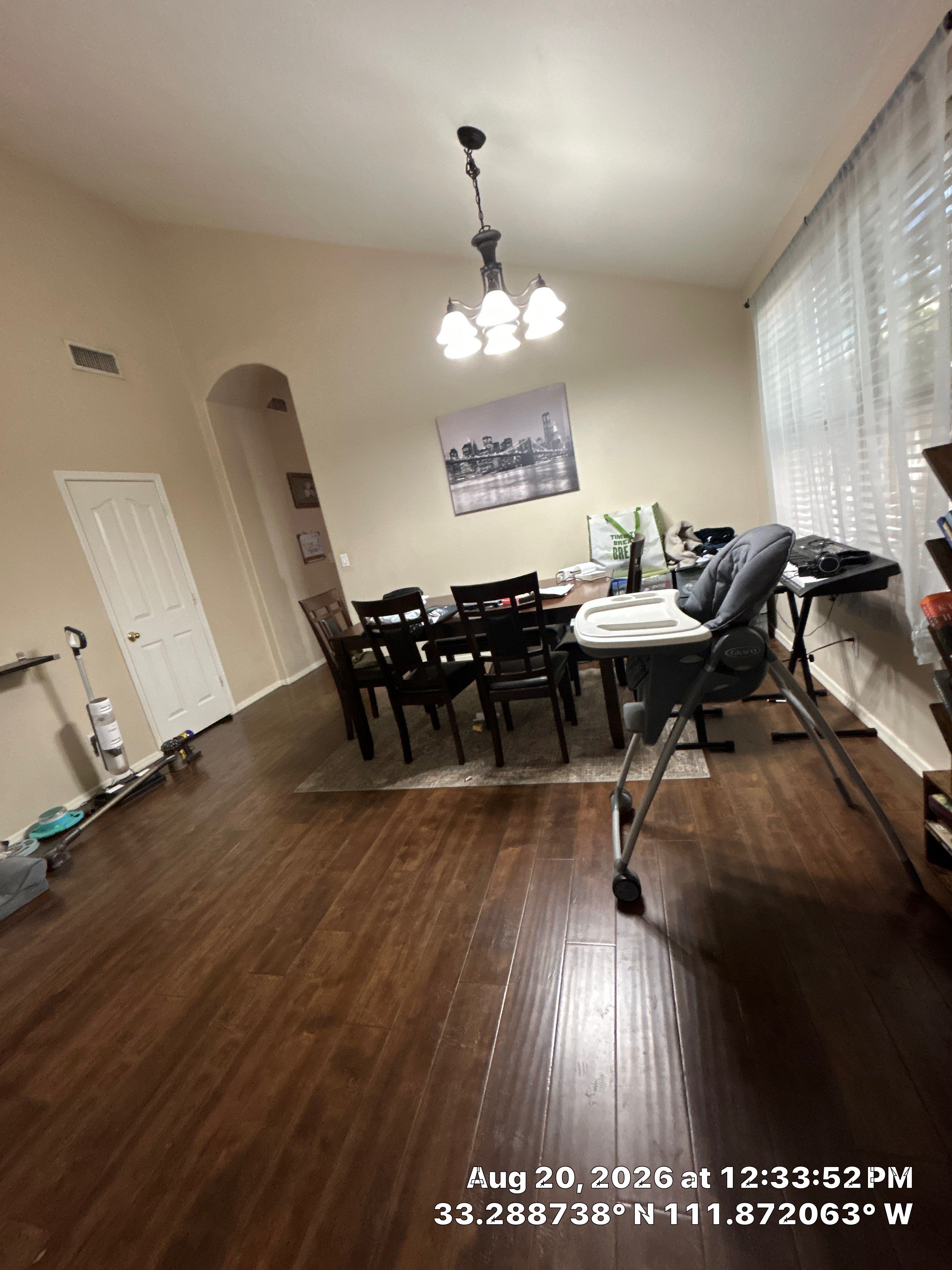 Dark Wood-Look Laminate Flooring Installation in Chandler by CompanyCam Sales Demo