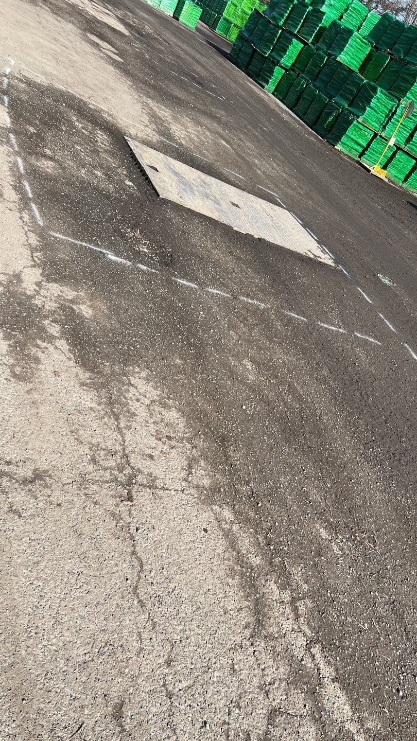 Scott's Miracle Grow | Asphalt Driveway Repair  by Jireh Asphalt & Concrete Inc 