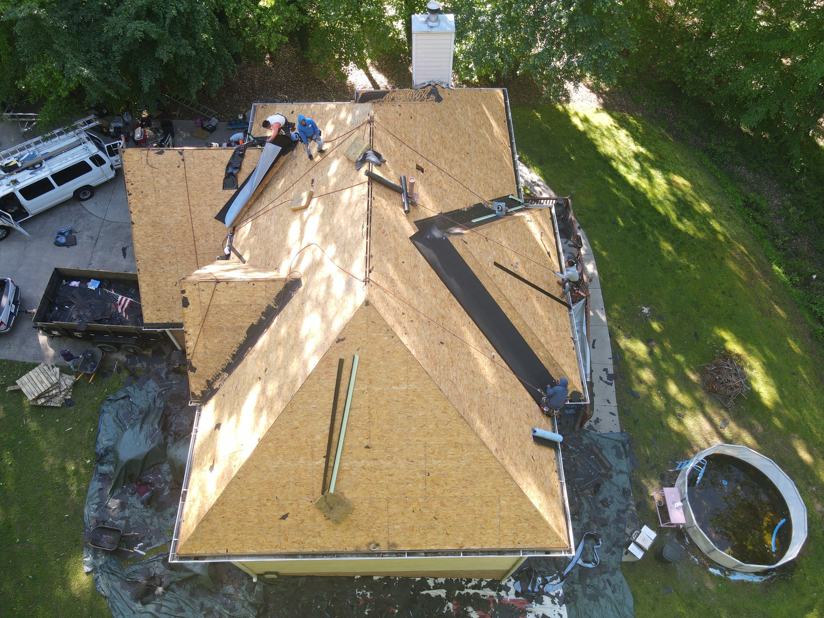 Residential Roofing Installation using Owens Corning Chateau Green  by Inspector Roofing and Restoration