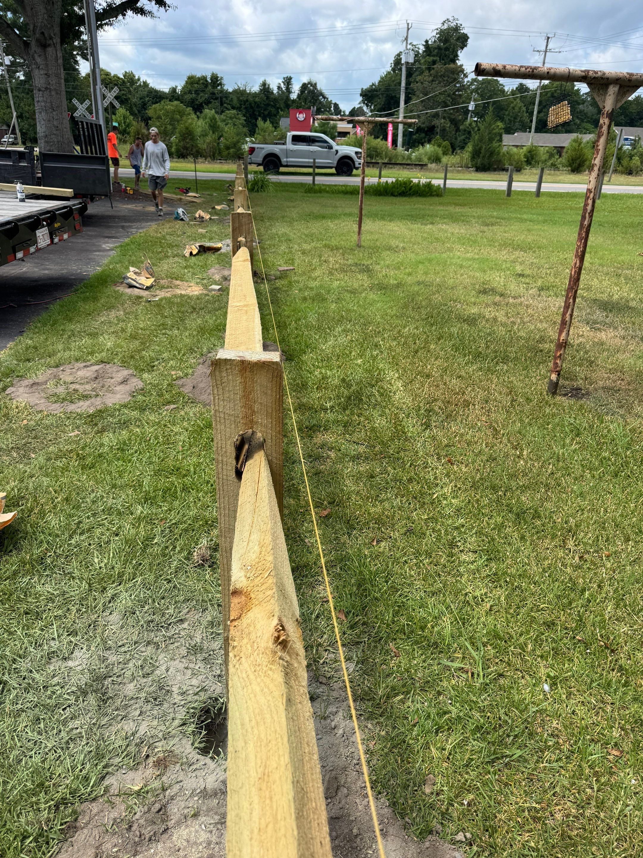 The Fence That Welcomes You Home by Tidewater Trim & Deck