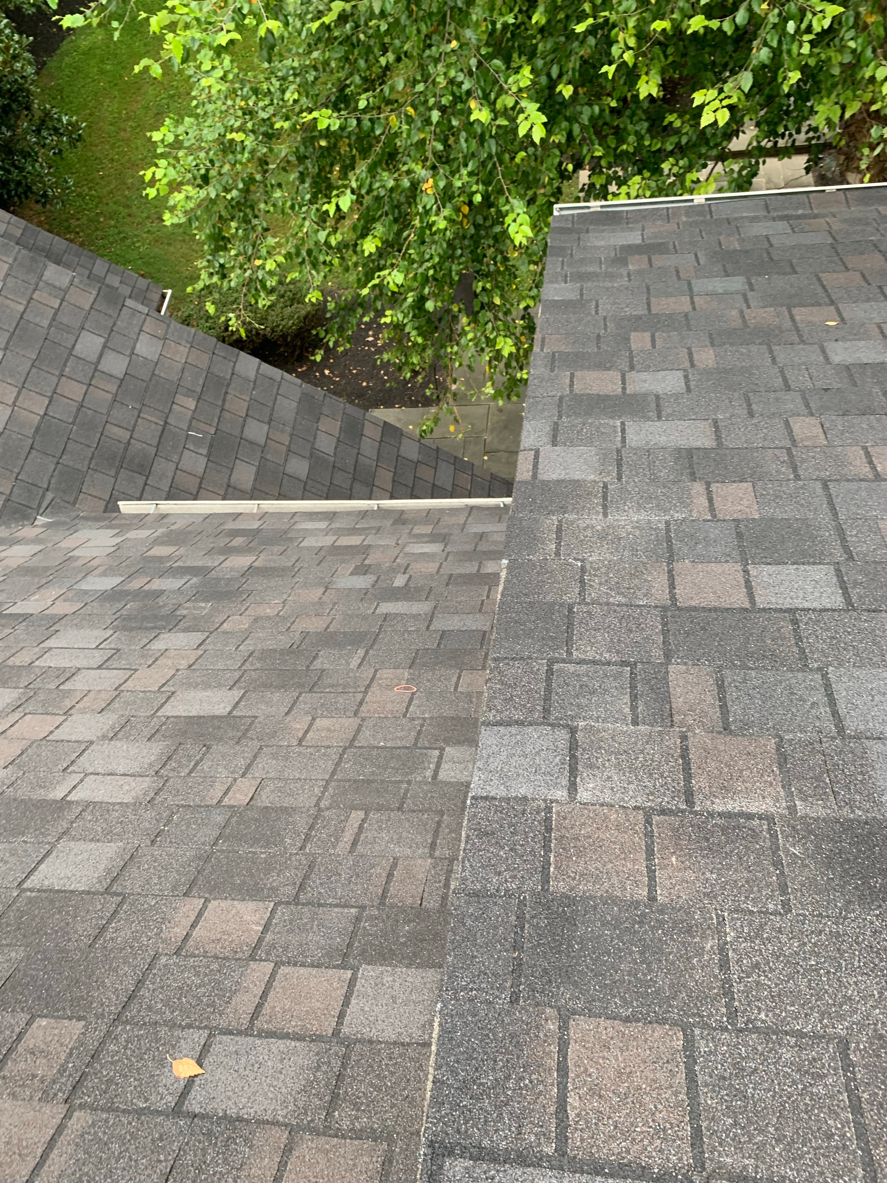 Skylight, Roof, and Gutter Replacement by American Home Contractors