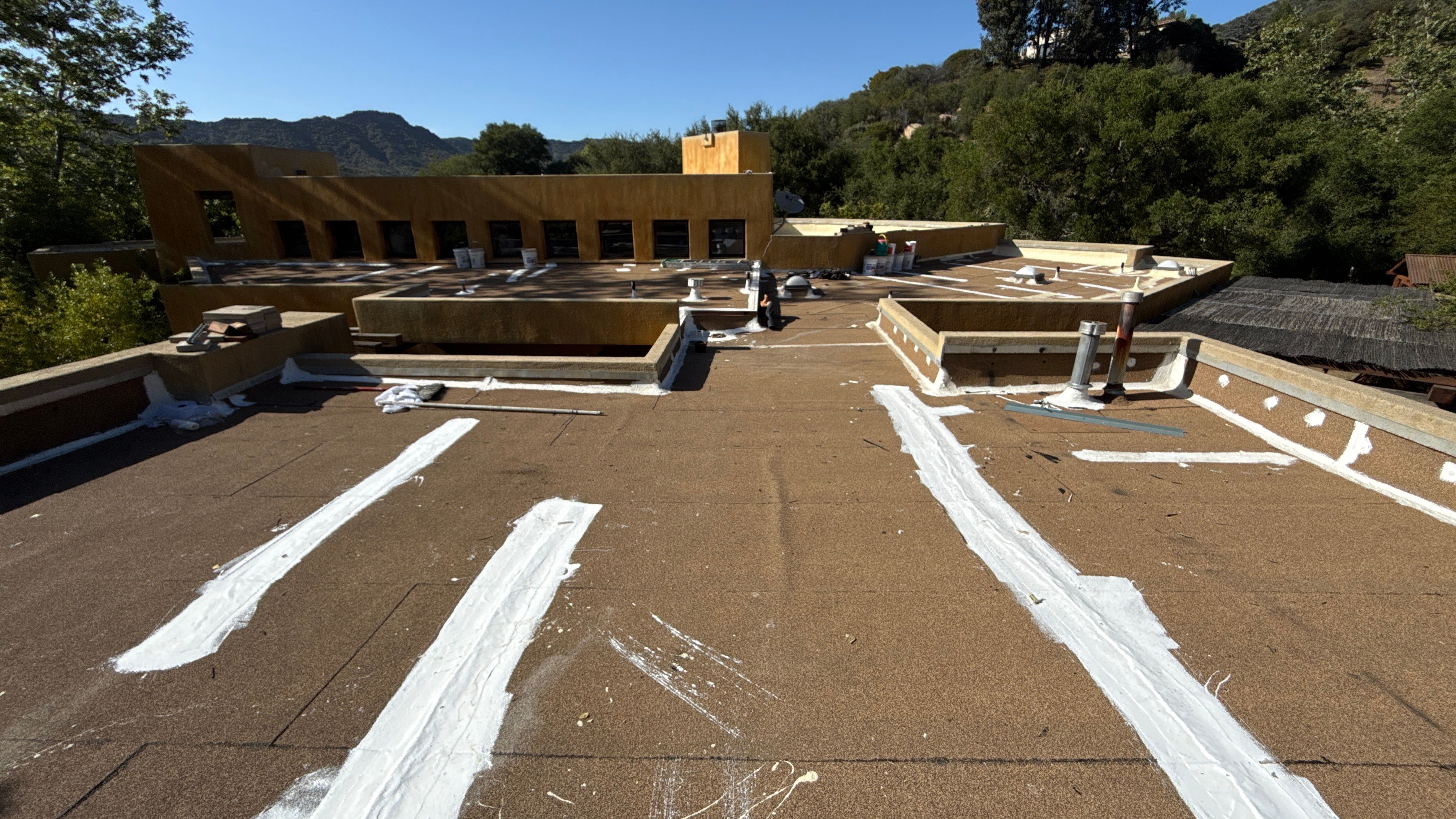 Tan Silicone Applied to a Stunning Residential Property in Calabasas by Hull Brothers Roofing