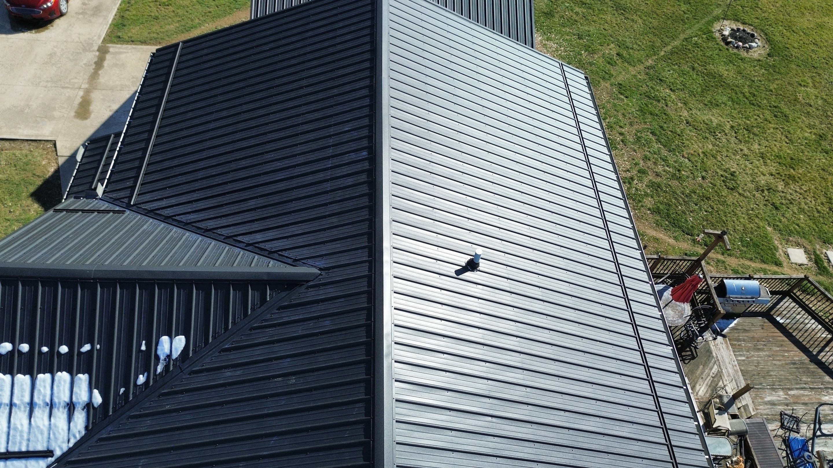 Residential Roofing Installation using Performance Panel Metal - Frost Black by RoofX 