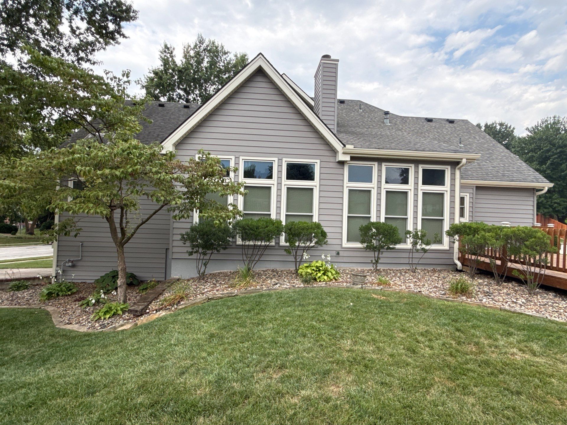 Whole Home Siding Replacement and Gutter Installation in Gladstone by EEC  Windows, Siding & Roofing 