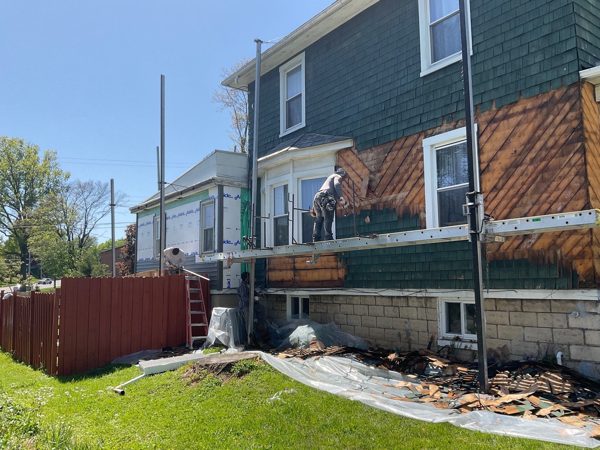 New siding & New Gutters by Alpha Design Services