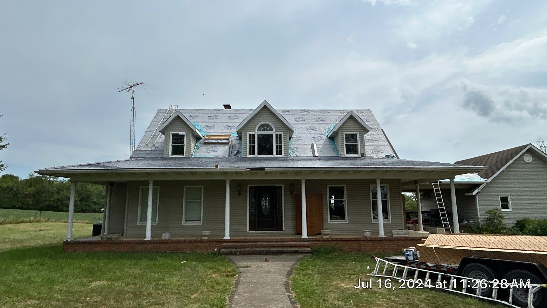 Residential Roofing Installation using ProVia Ironstone Slate Metal Roofing by RoofX 