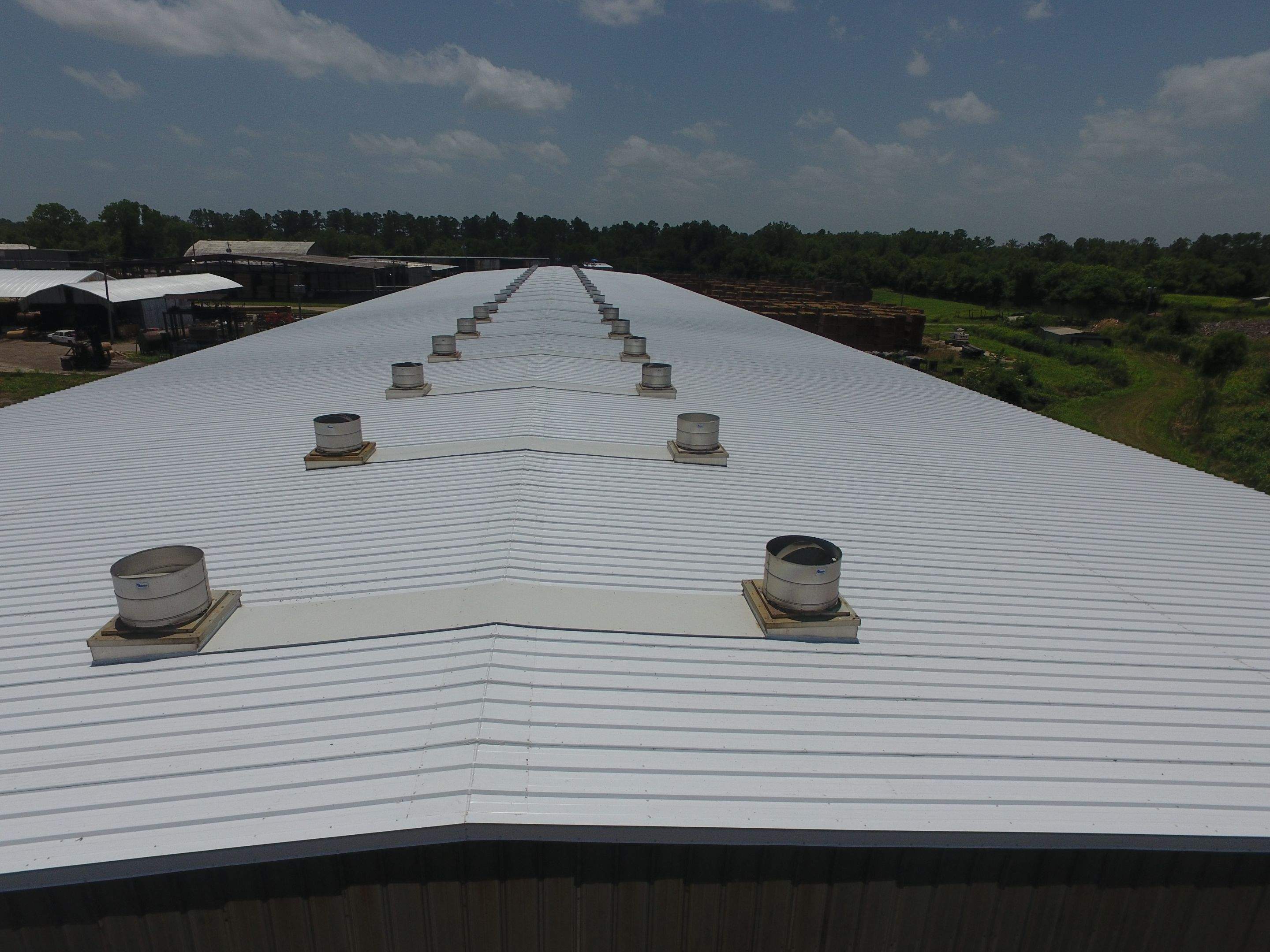 Commercial Roofing Installation using Aluminum Roofing panels by Hostetler Roofing