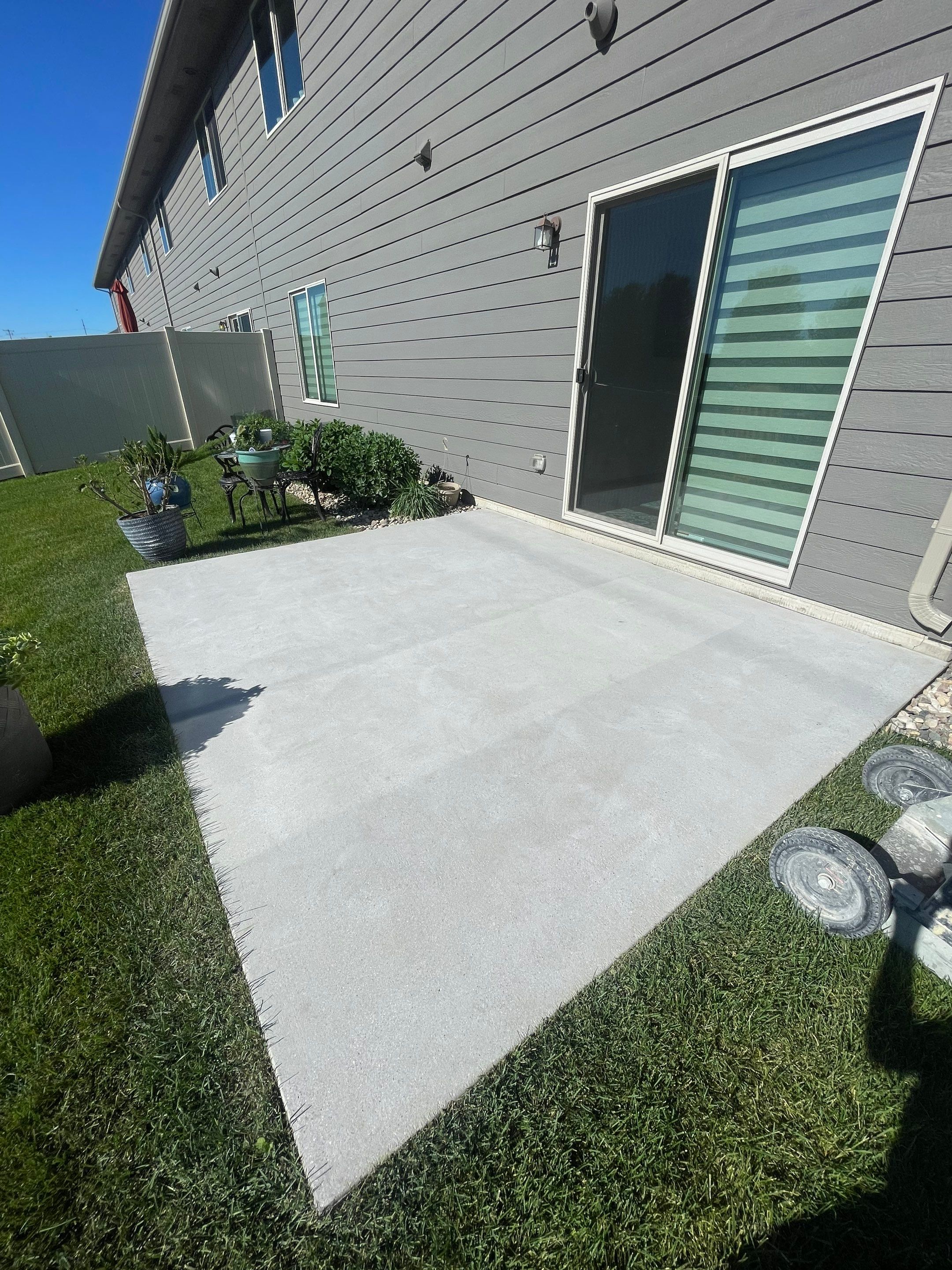 Custom Concrete Coating for Sioux Falls Patio and Front Walkway by Select Painting, Coatings & Garage Cabinets