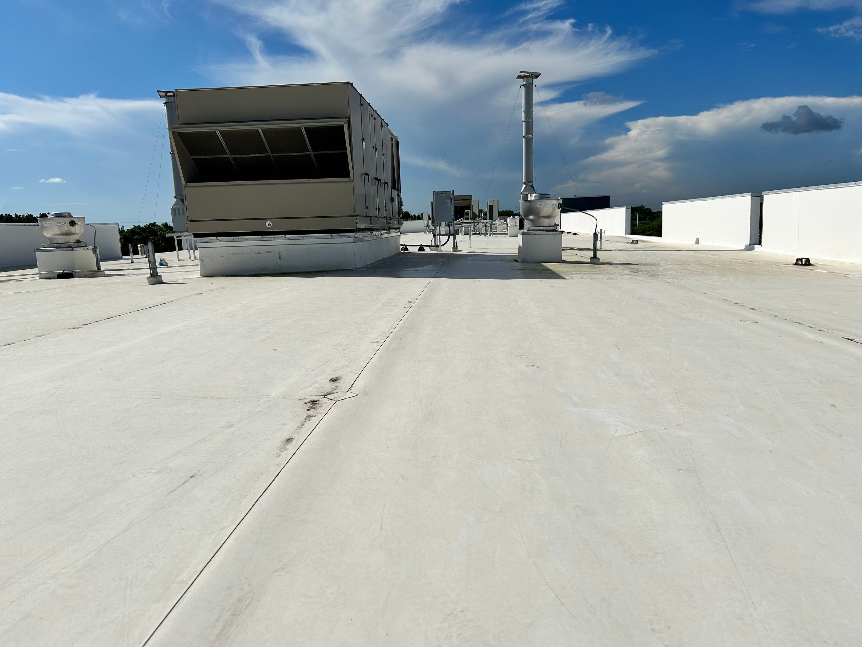 TPO Flat Roof Installation at Dade Quail Roost in Miami by AJF ROOFING INC