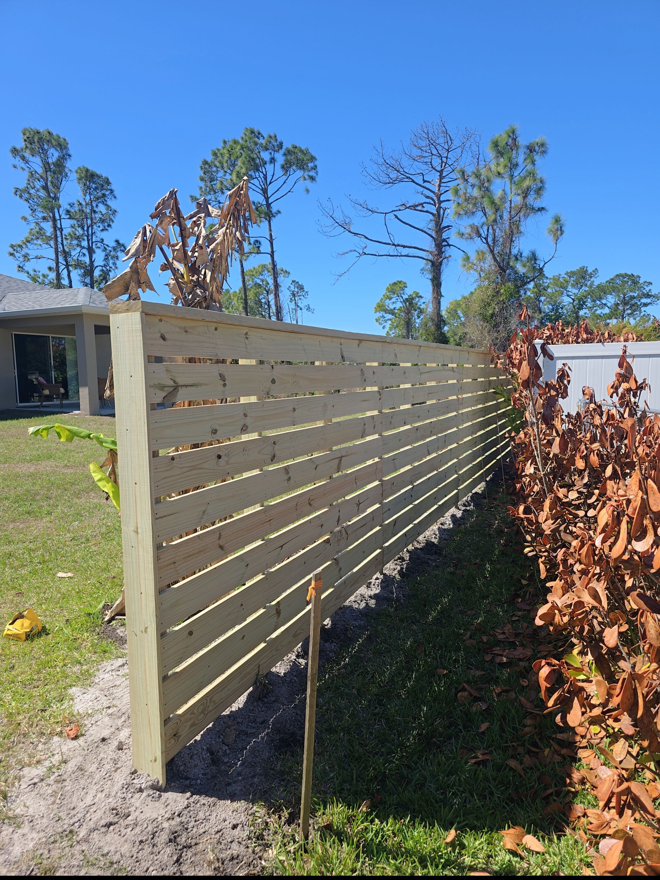 Horizontal Wood Fence in North Port by True Fence LLC