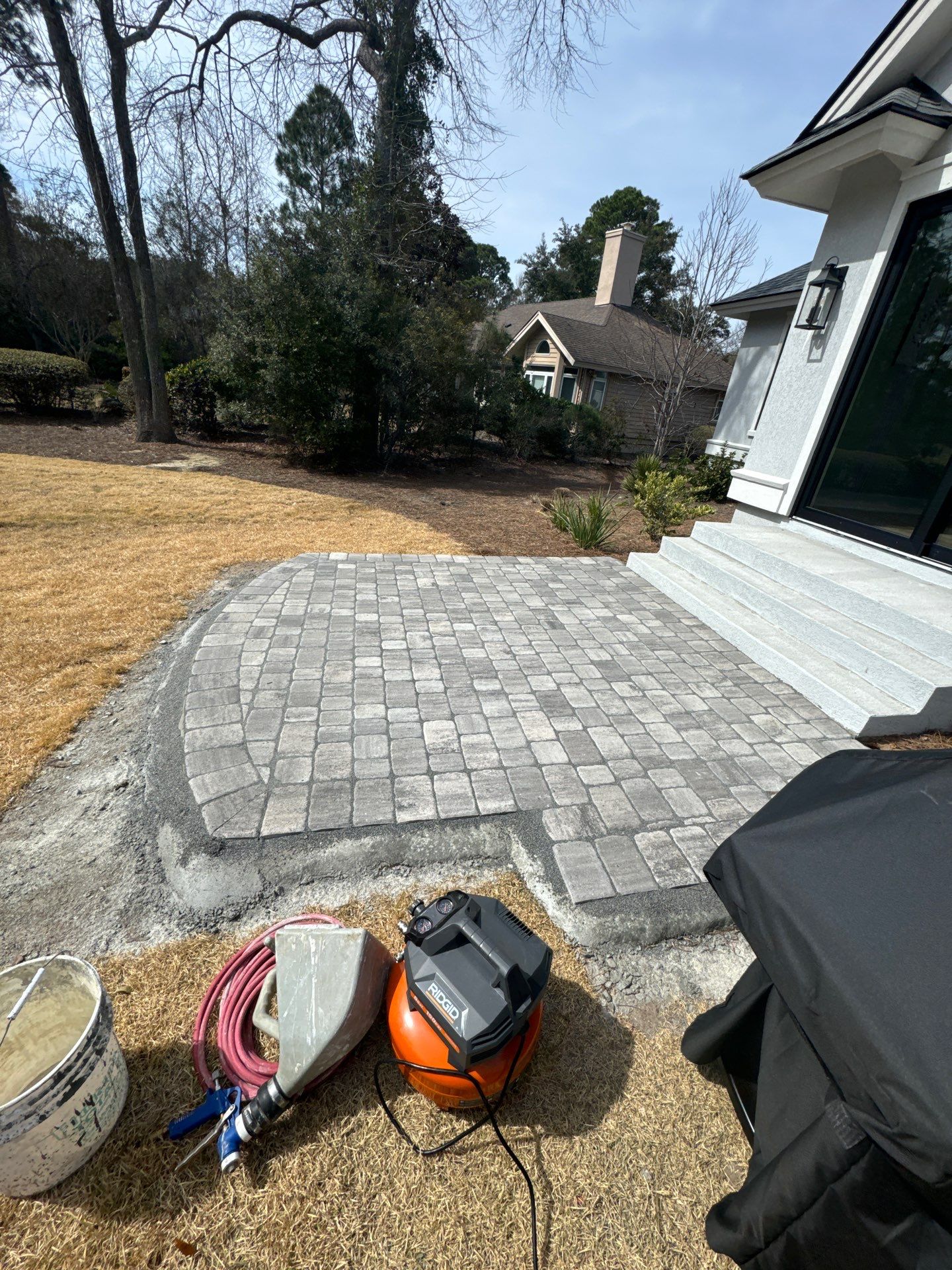 Stamped Concrete Patio and Circular Paver Installation in Hilton Head Island by Lowcountry Scapes, LLC