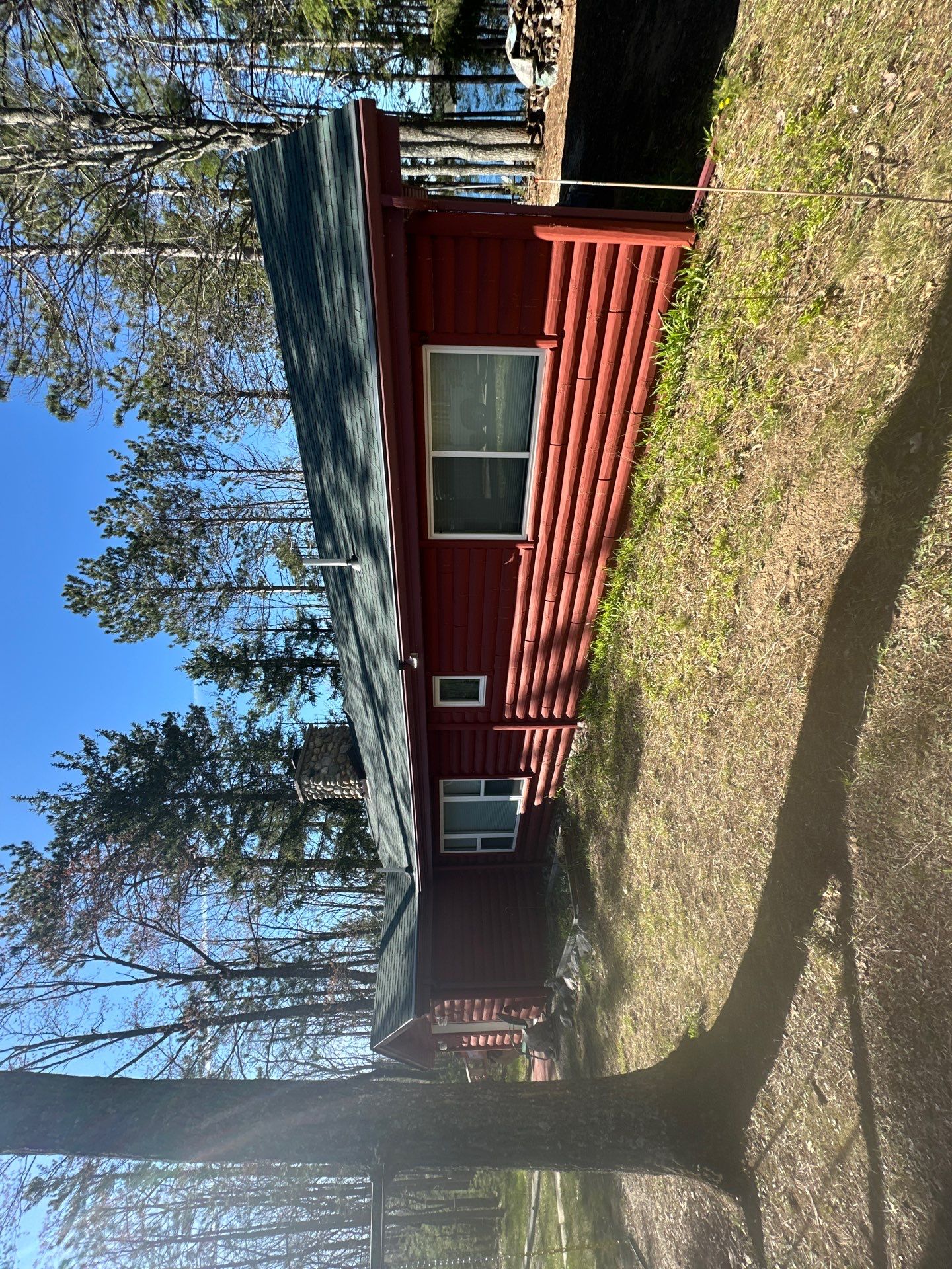 Gutter Helmet Protection System for Wooded Log Cabin in Johannesburg by Rainbow Seamless Systems