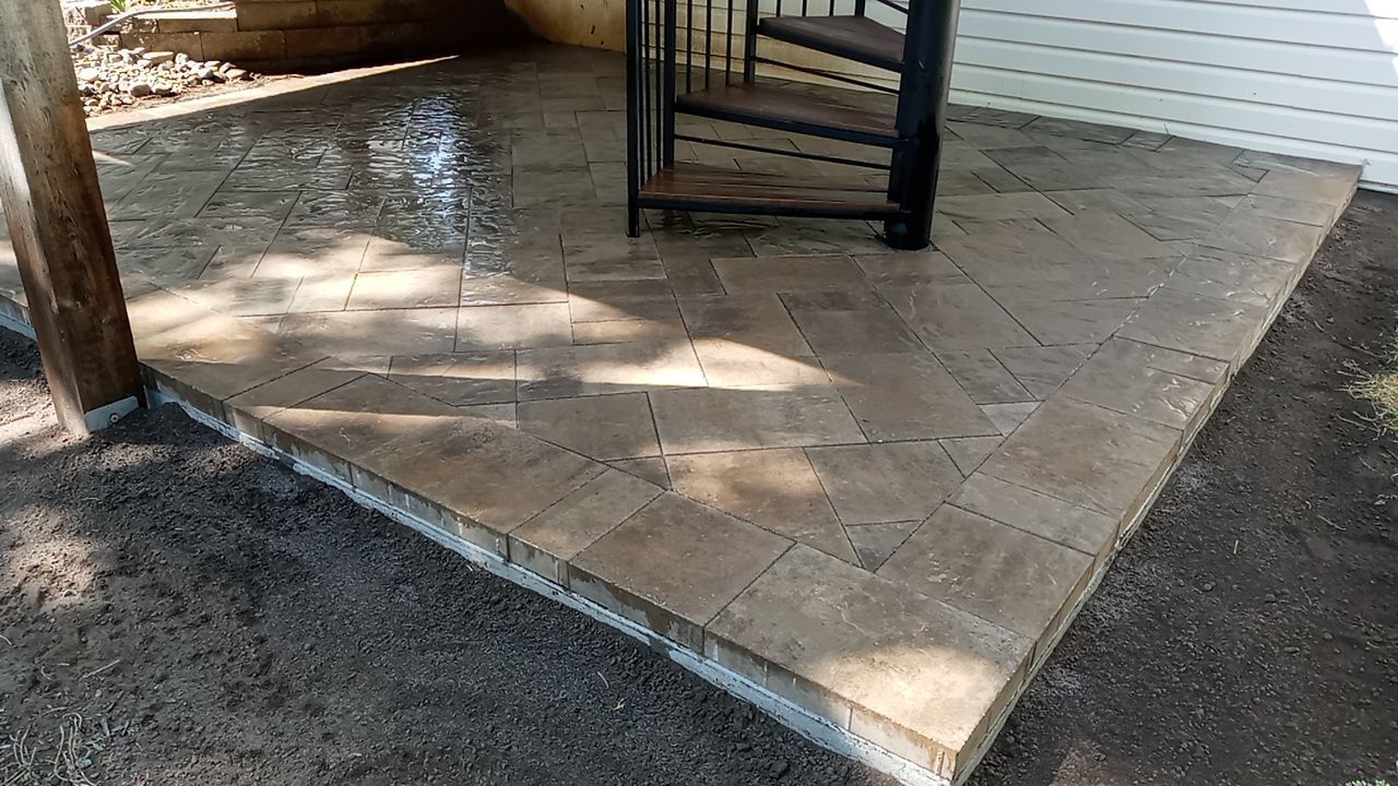 Back Yard Paver Patio by LAND ESCAPES LLC