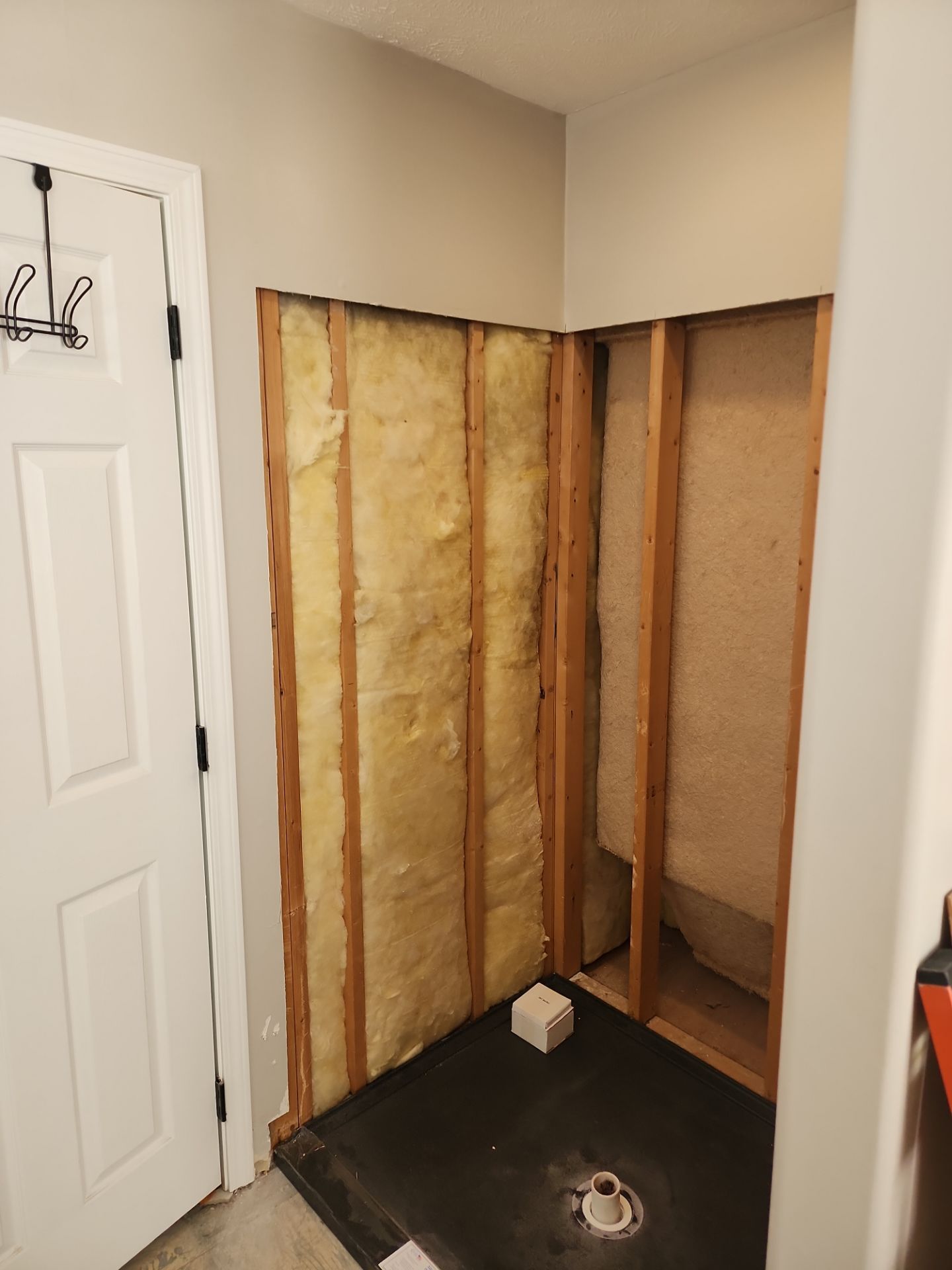 Master Bathroom Renovation Featuring Dark Textured Shower Panels in Branson West by Kitchen Works LLC