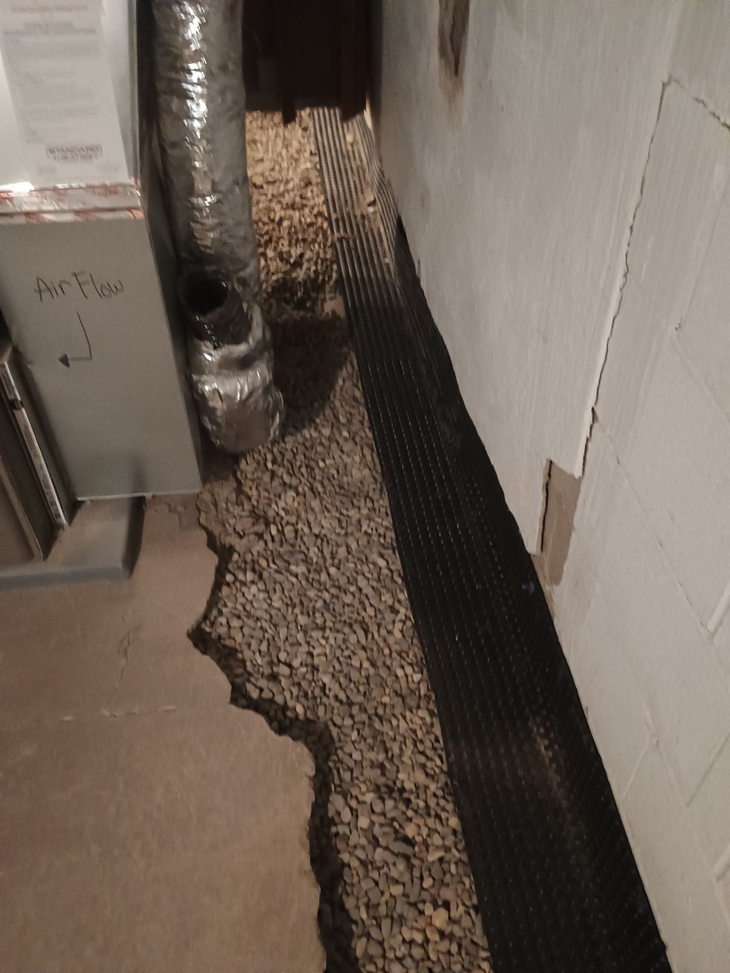 Interior Drain Tile Installation in South Minneapolis by Waterproofing Northeast