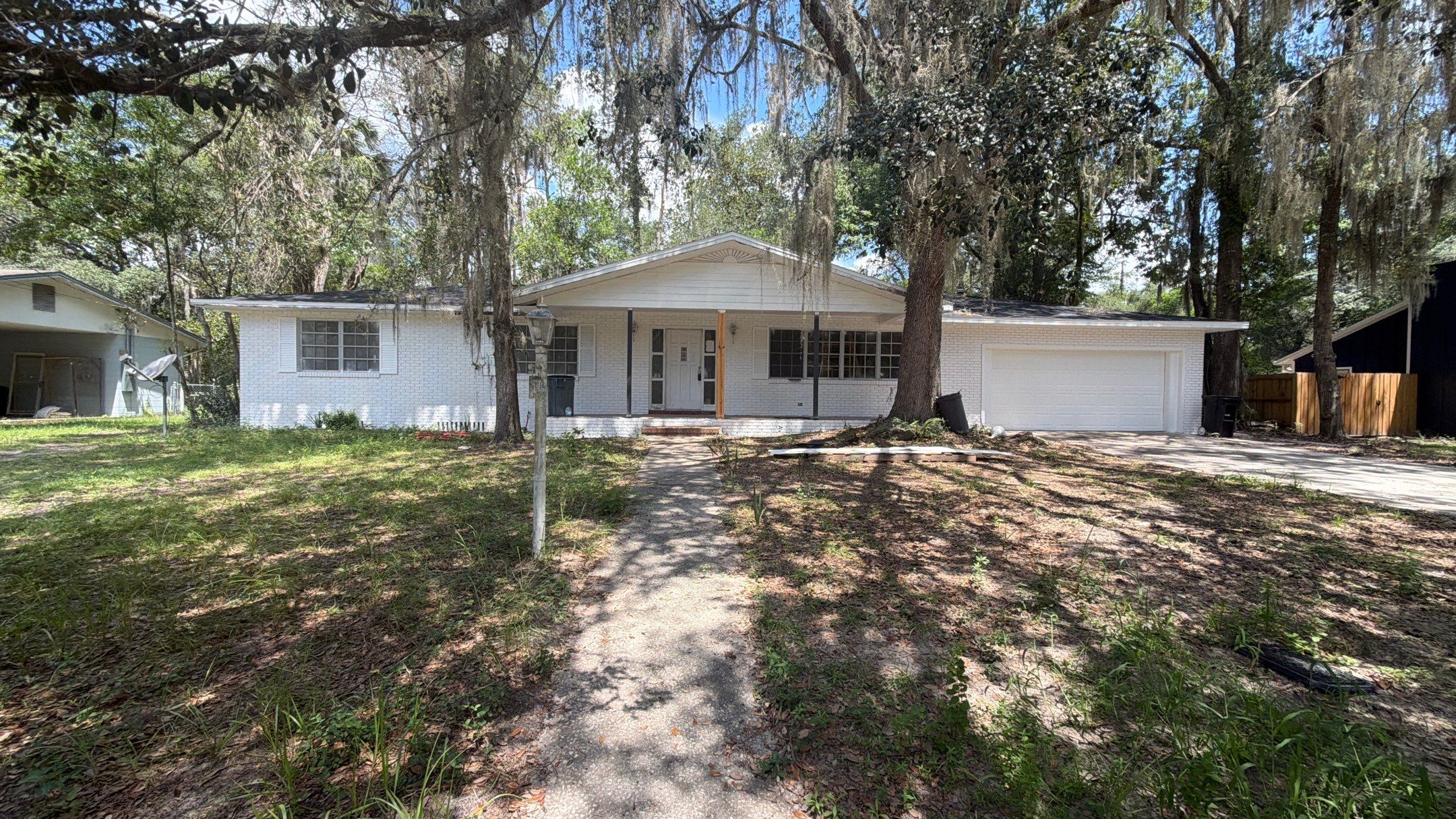 Energy Efficient Window Replacement for Gainesville White Brick Ranch by Windows & Doors Store