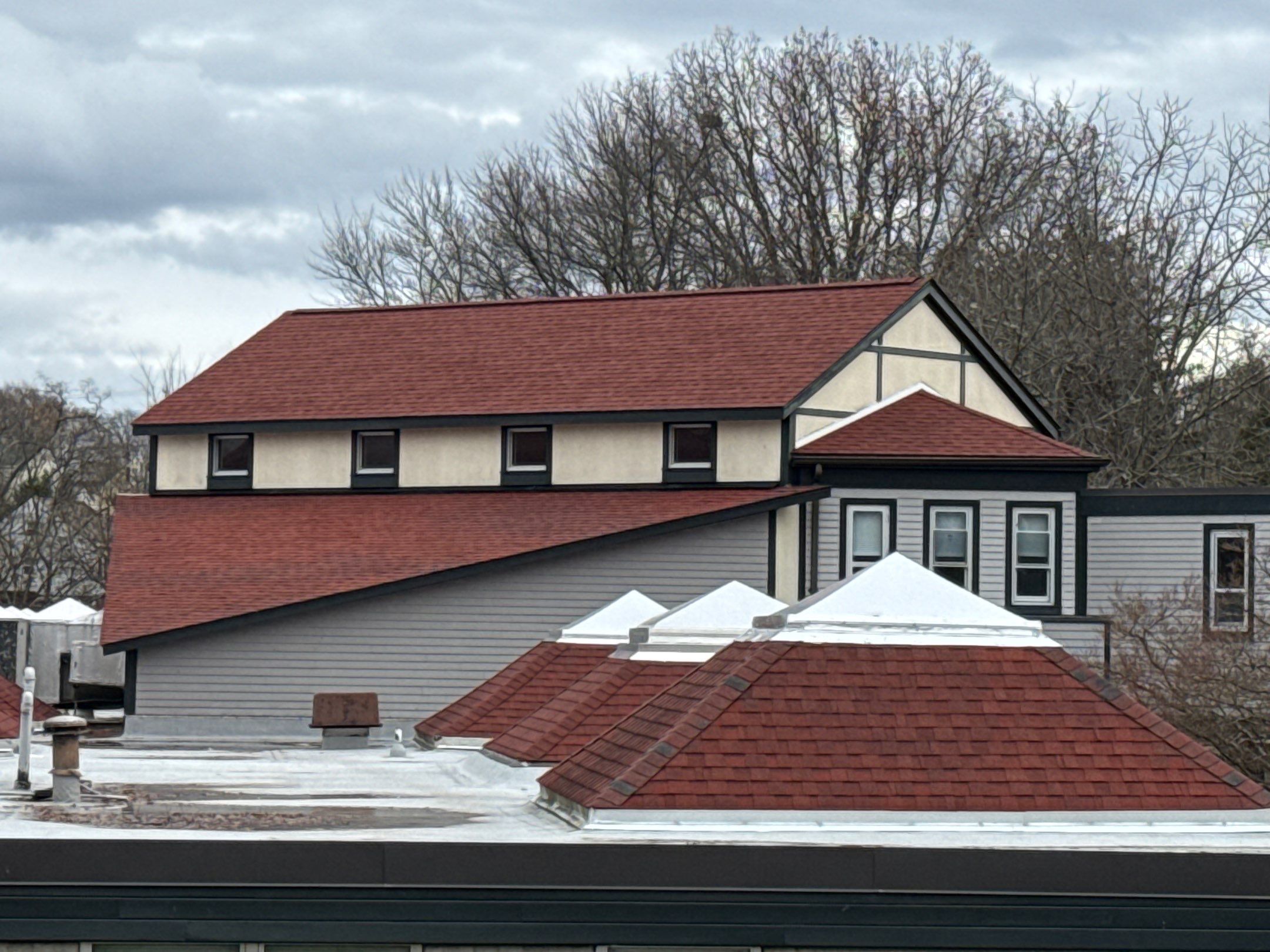 Red Oak Roofs by Pinnacle Roofing & Skylights