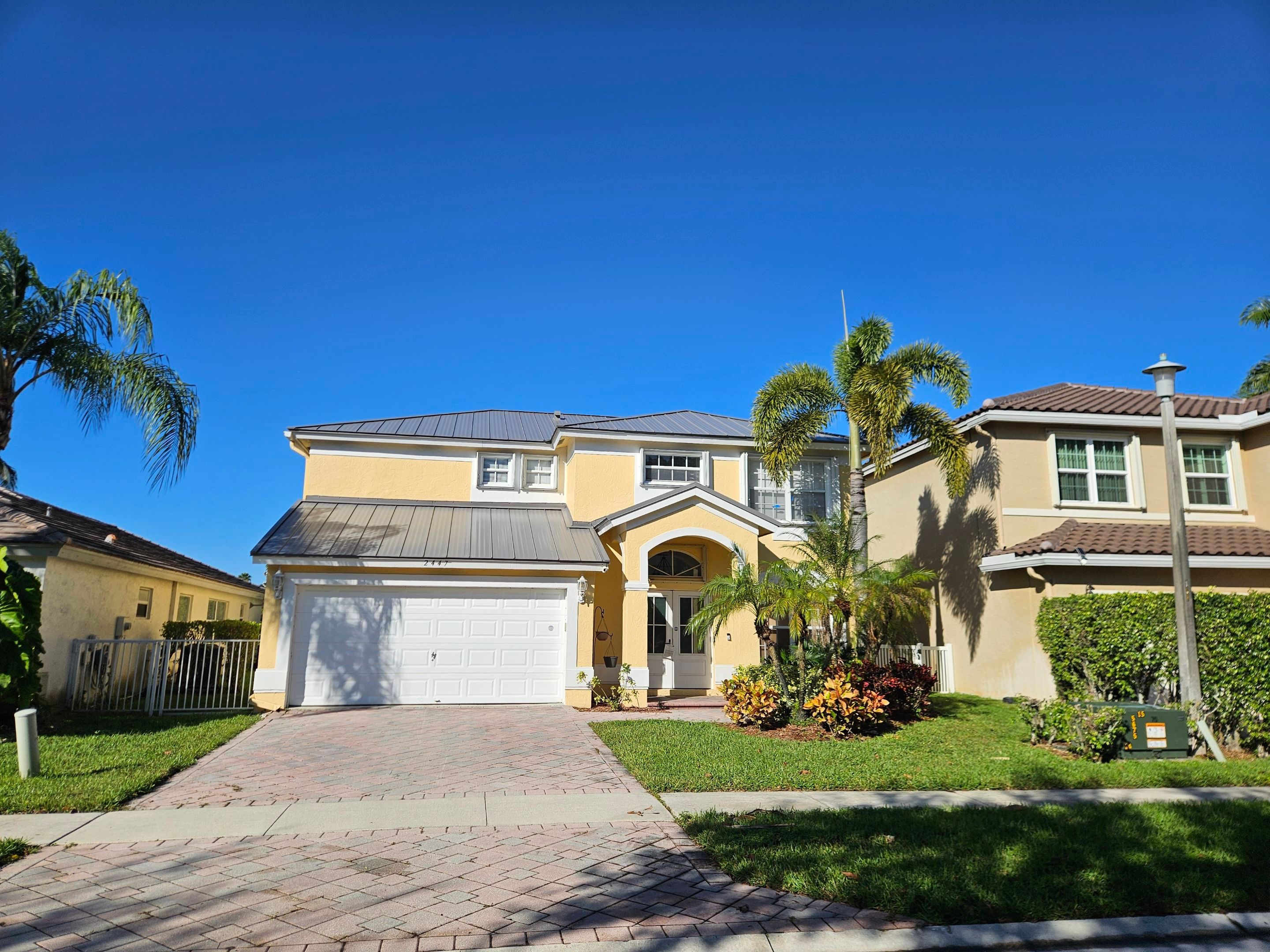 Residential Roofing Installation using 1" Nail strip metal roof by BLUES BROTHERS CONSTRUCTION CORP