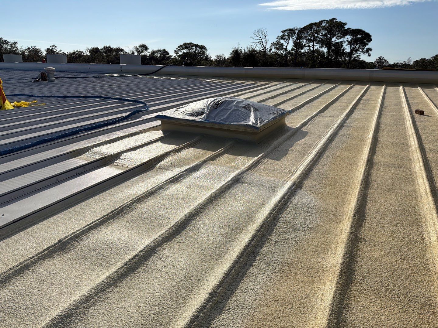 Sarasota Industrial Warehouse Metal Roof Silicone Coating Restoration by CES Roofing