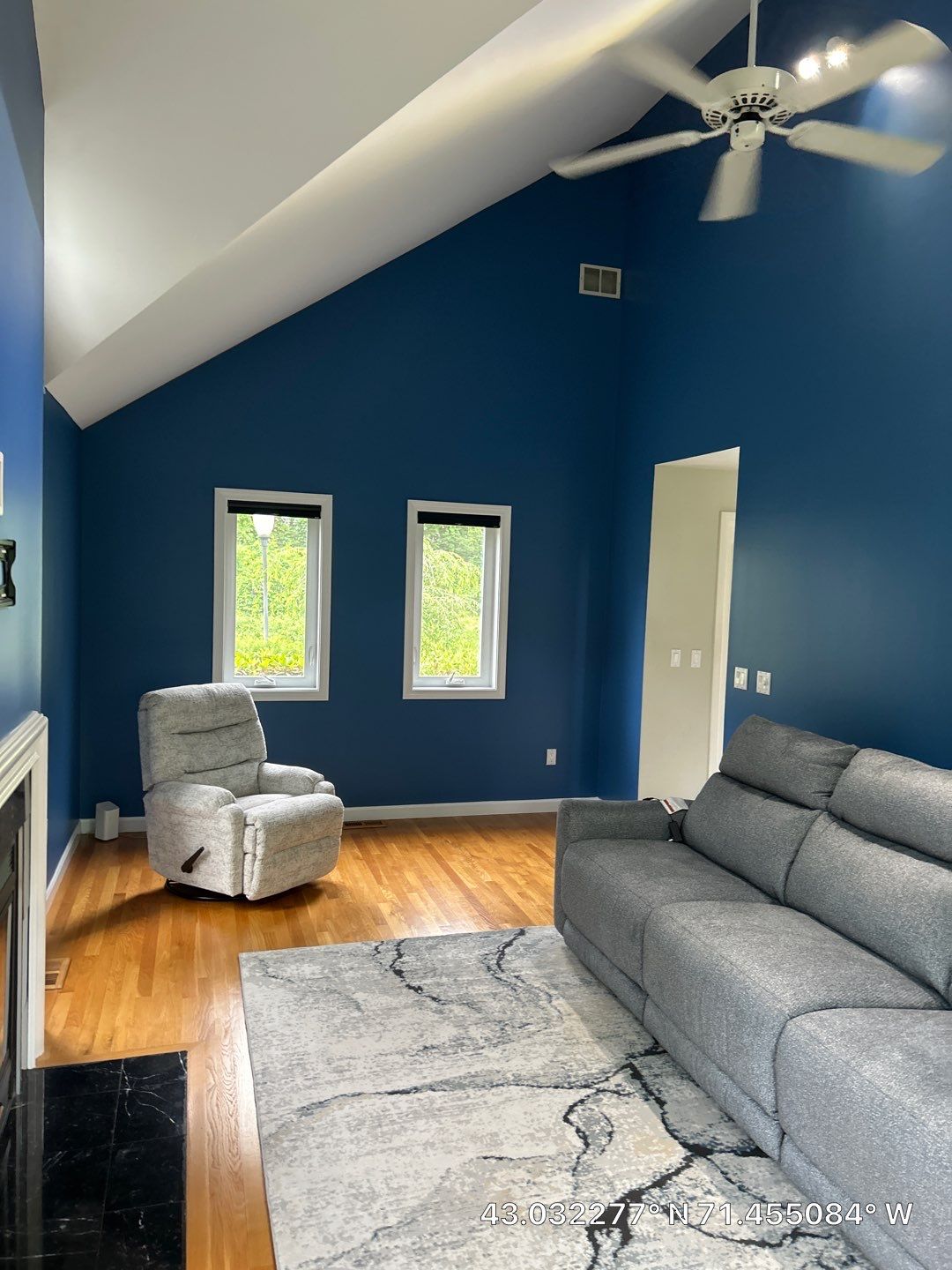 Interior Living Room Painting with Deep Blue Walls in Manchester by The Persnickety Painters
