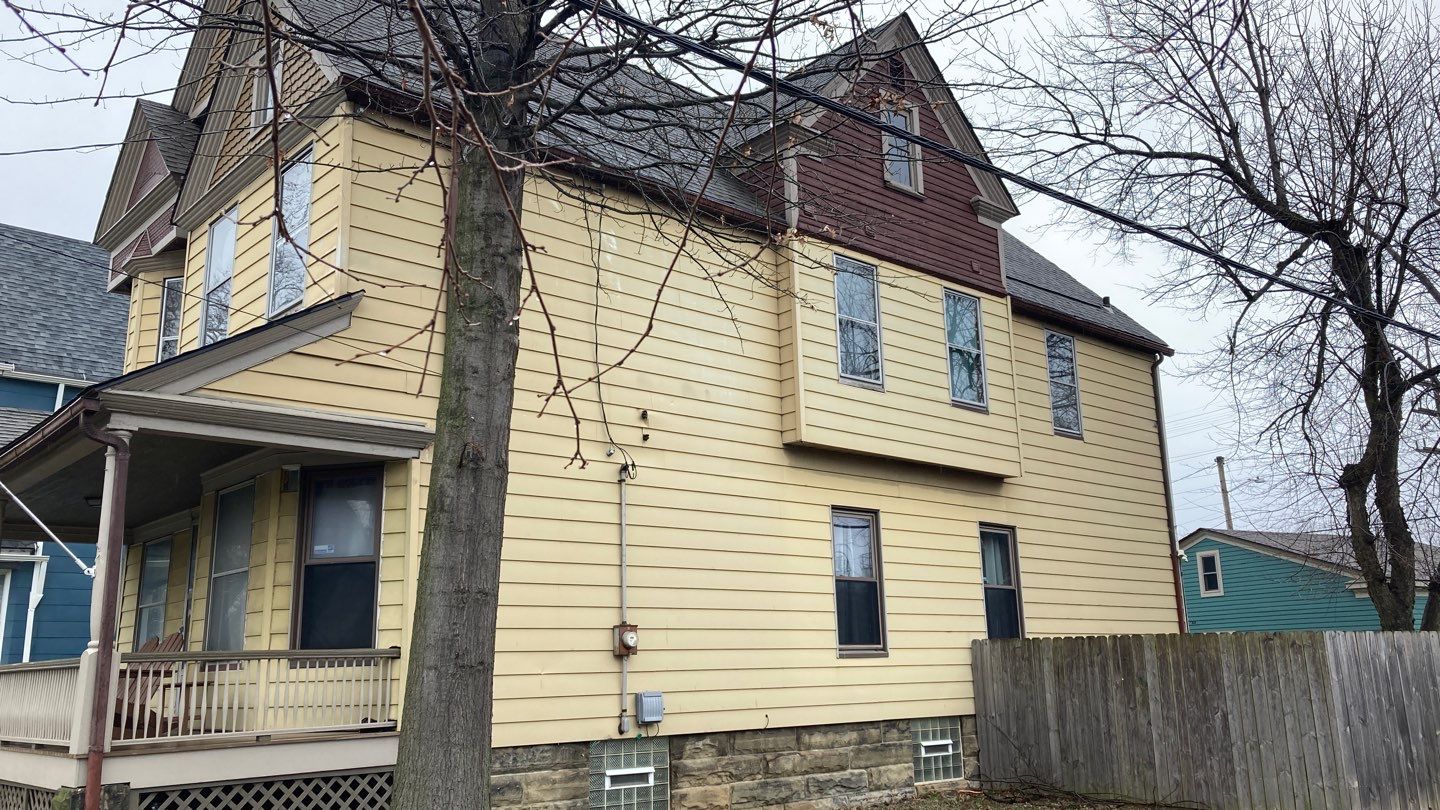 James Hardie Siding on Antique Home by Absolute Roofing and Construction