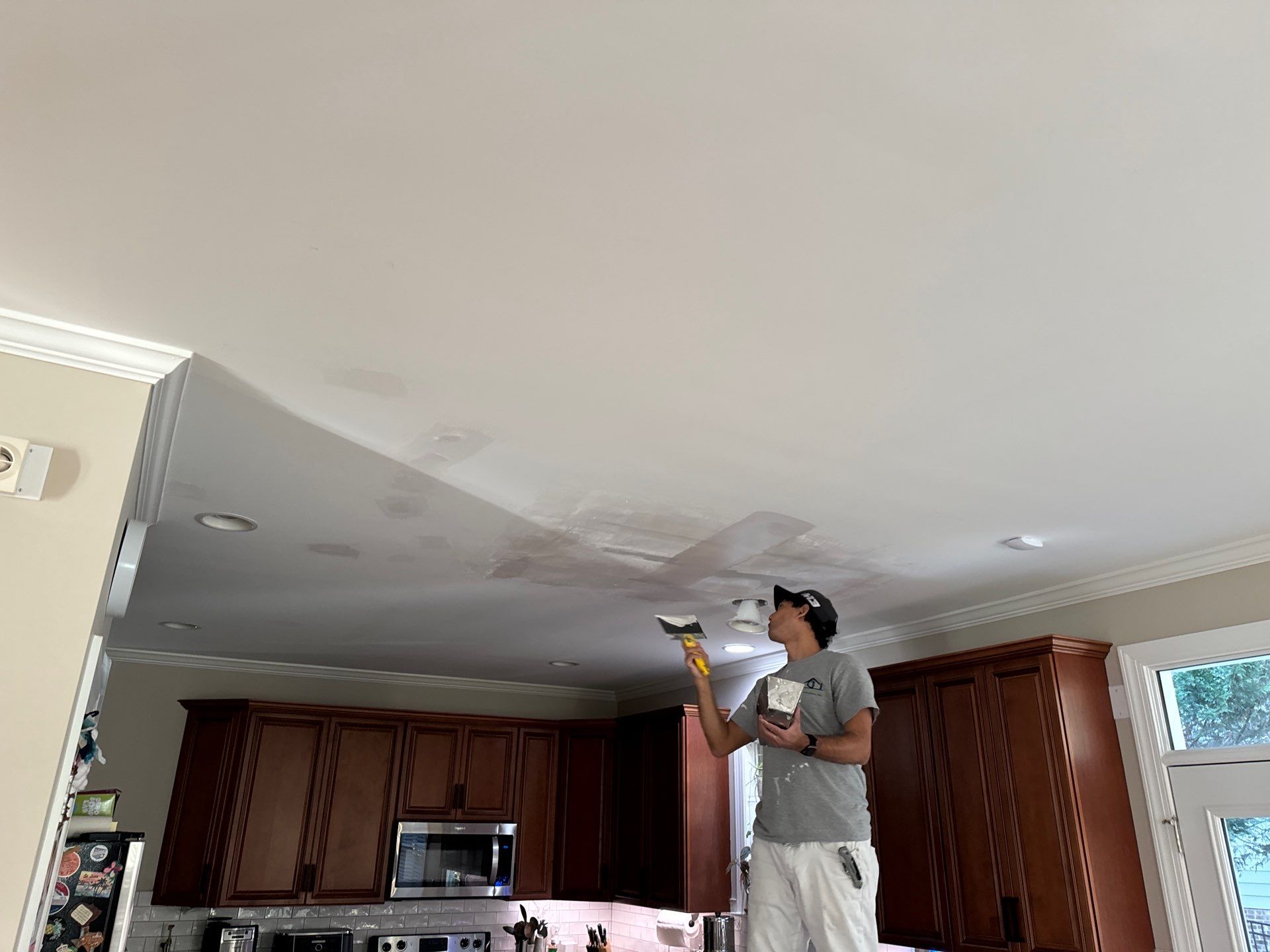 Drywall damage repair and repaint by GonzalezPainters & Contractors Inc 