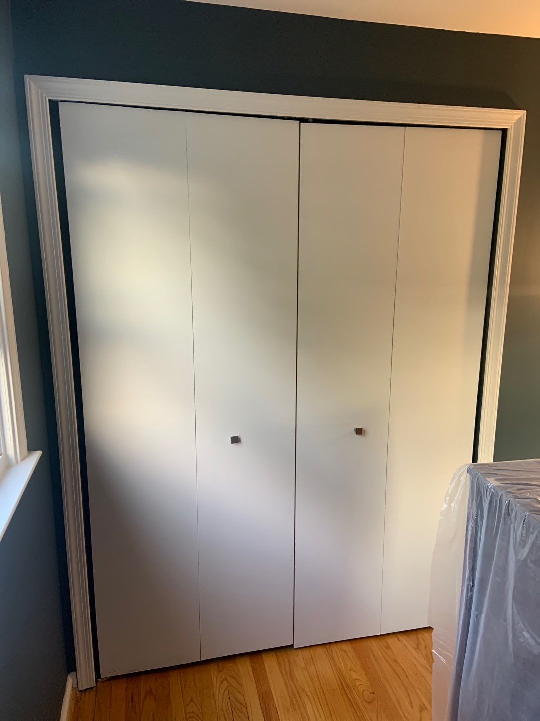 Bedroom Remodel using Custom Built Doors & Shelves by A1 NERDY HOMES LLC