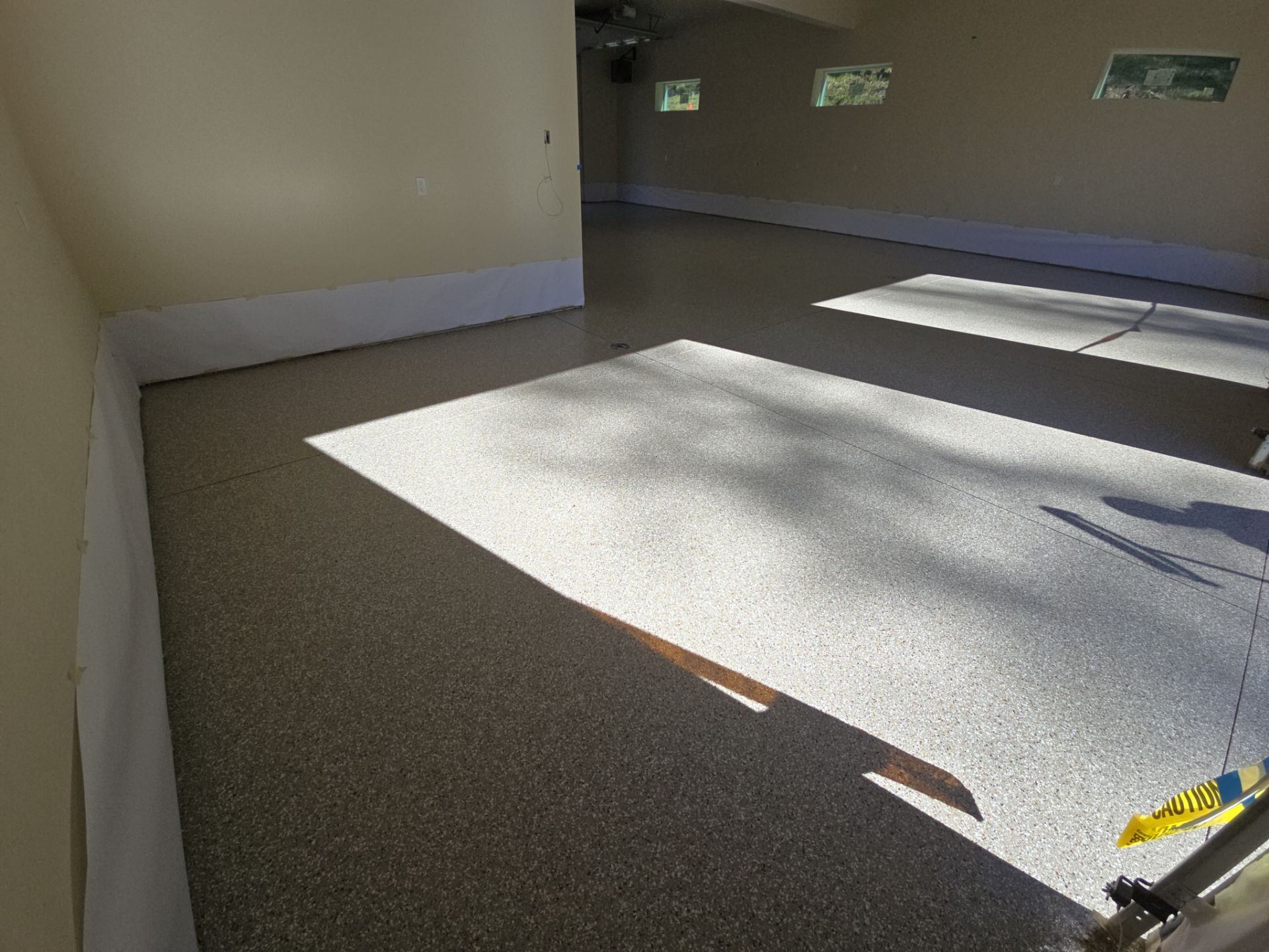 Garage Transformation using Pebble Beach by Croc Coatings, LLC