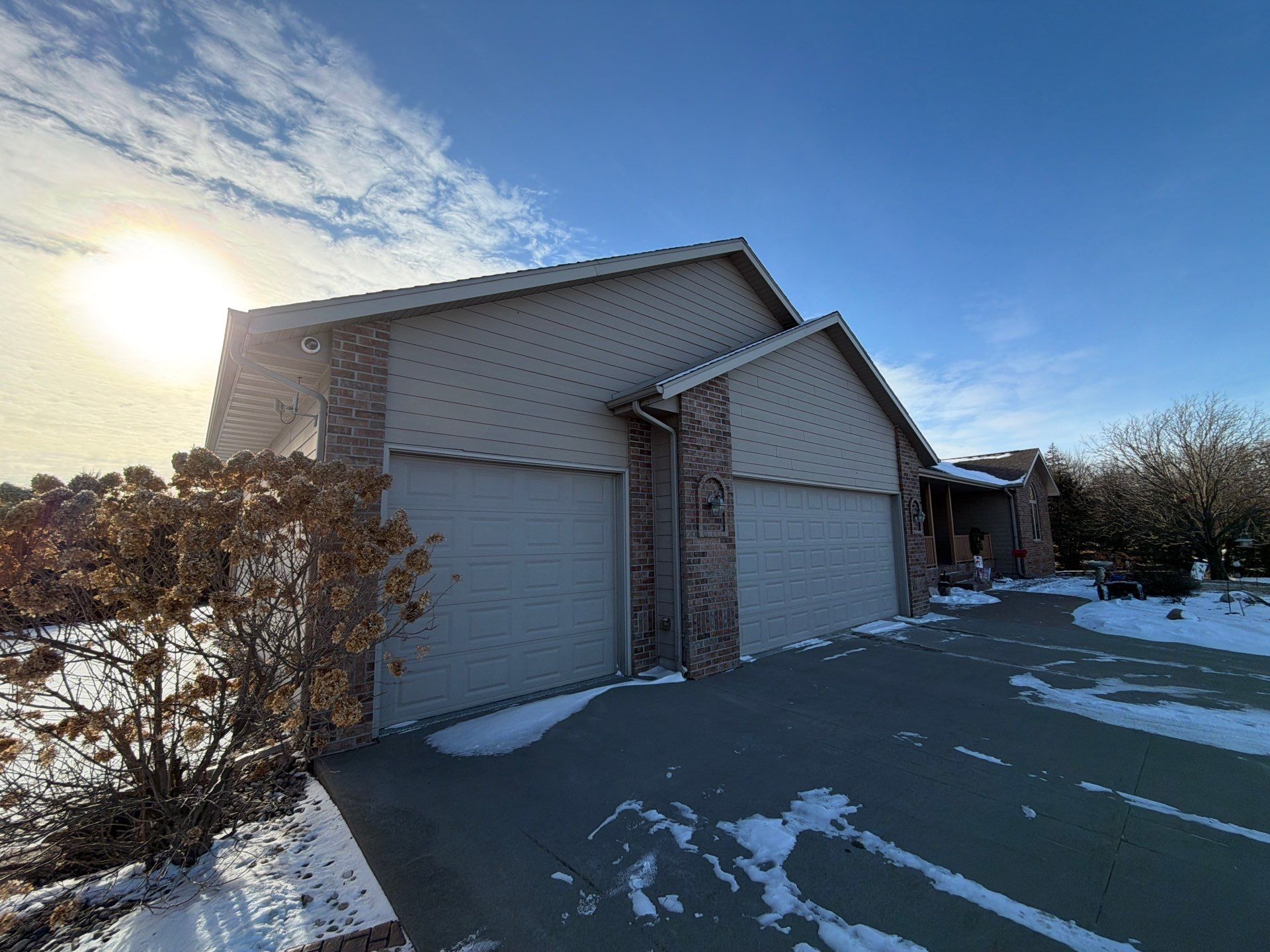 Full Exterior Siding Transformation and Trim Update in Garretson by Select Painting, Coatings & Garage Cabinets