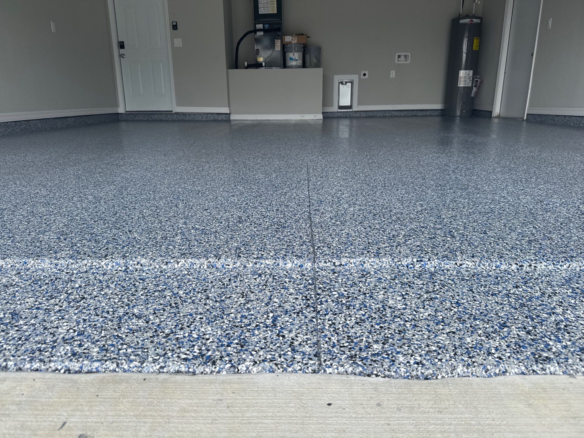 Garage Project in Ocala, FL in Denim by Cross Creek Concrete Coatings