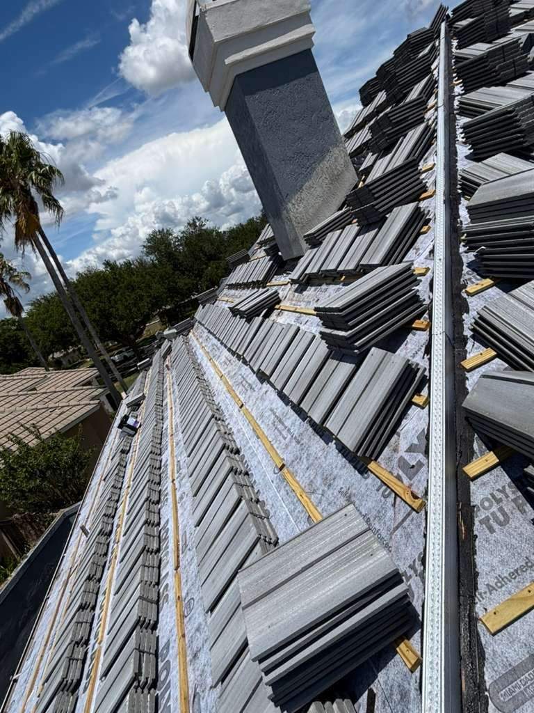 Winter Park Concrete Tile Roof Replacement and Chimney Flashing Installation by Fortified Roofing Solutions Corp.