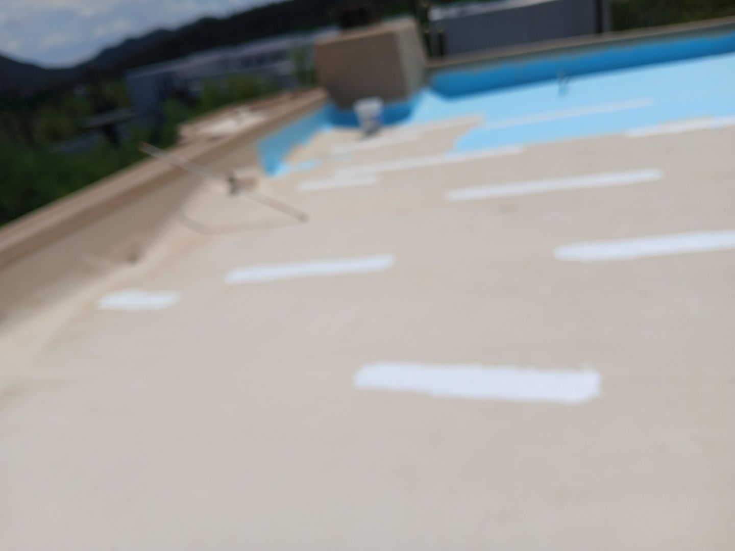 Residential Flat Roof Elastomeric Coating and Restoration in Tucson by West Coast Roofing AZ