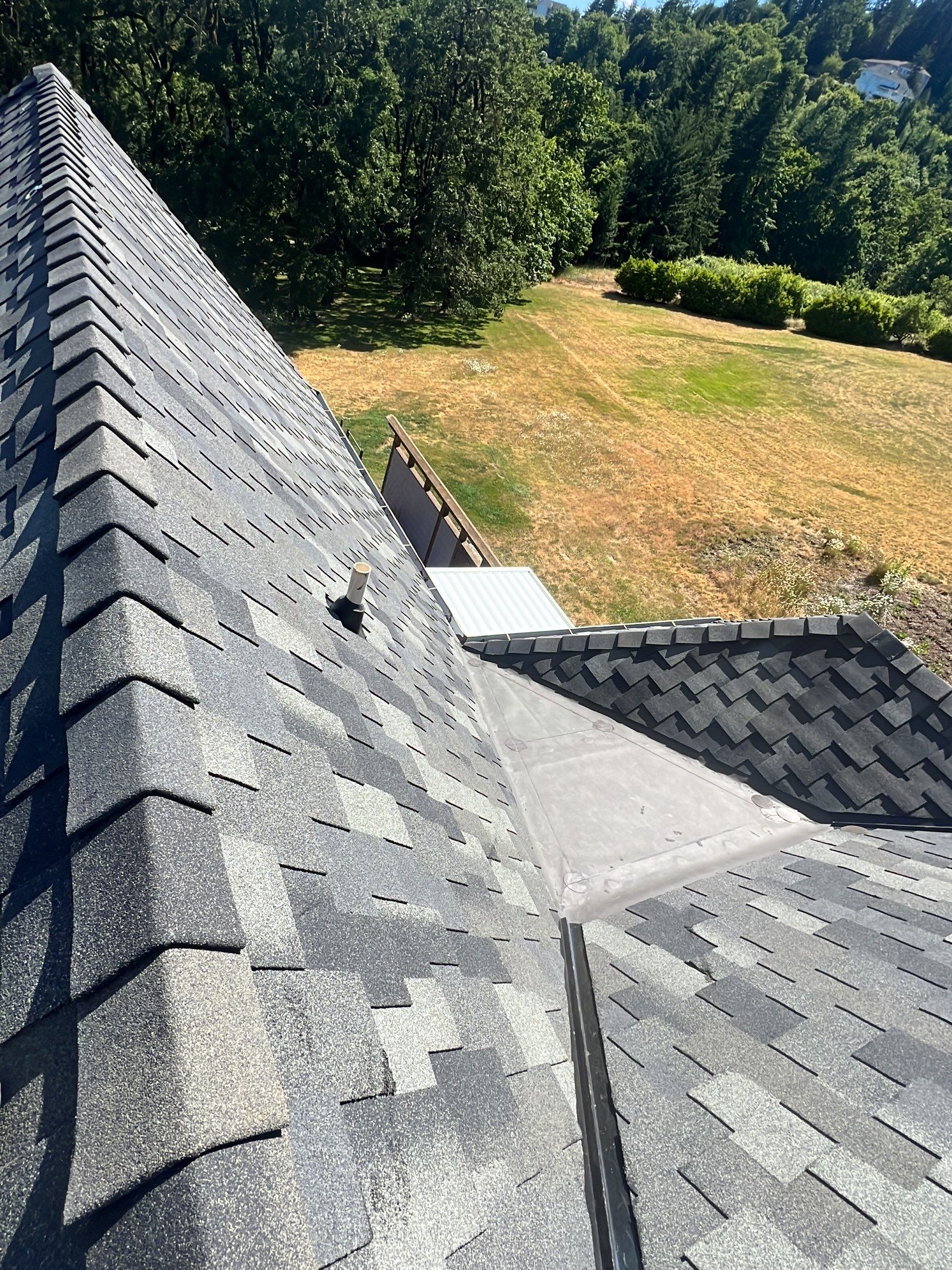 Residential Roofing Installation using Malarkey Windsor 50 Year Shingle (Color: Storm Grey) by Orezona Building & Roofing Company, Inc.