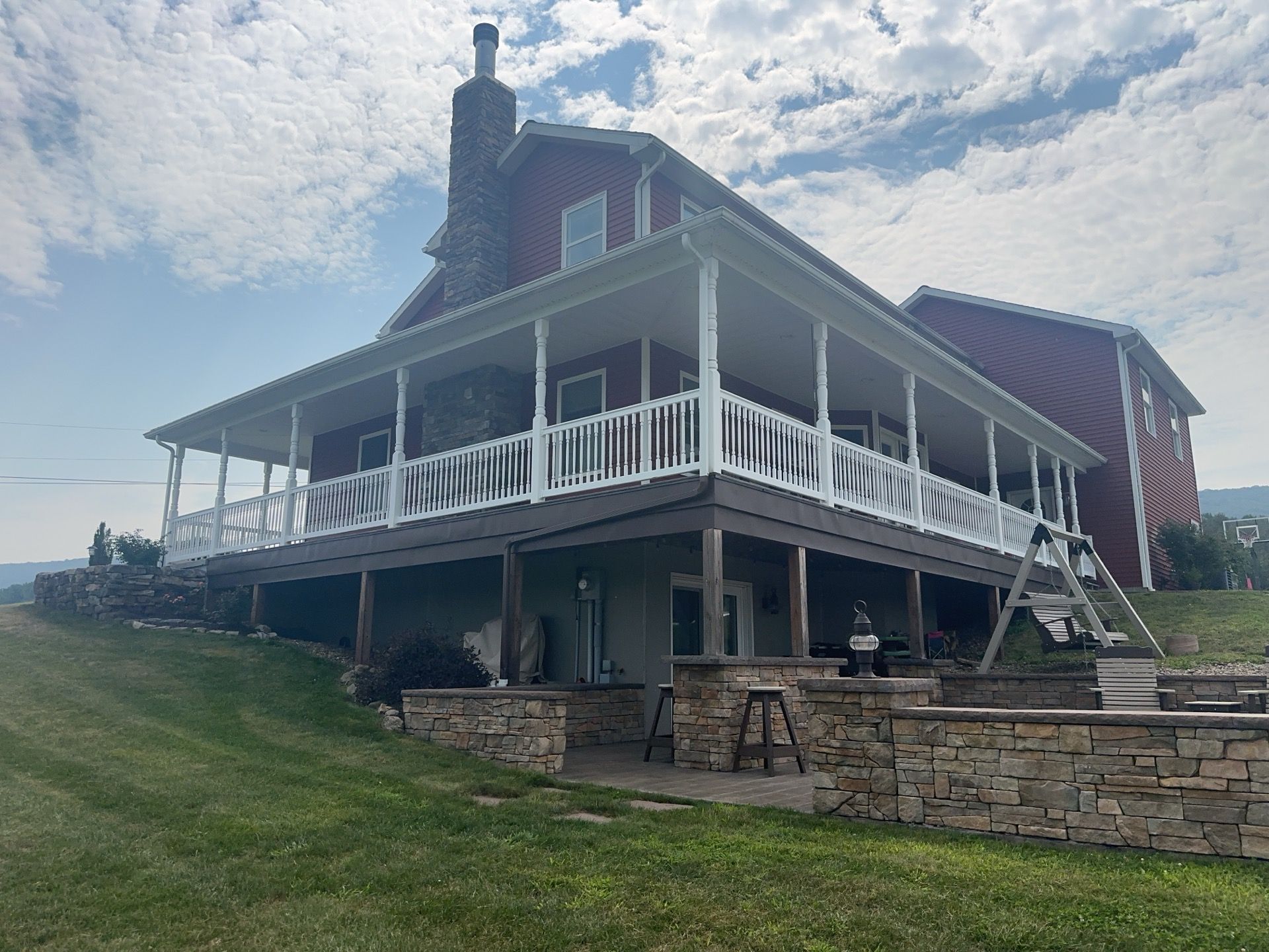 Covered Deck Addition With Custom Gable Roof in Tower City by Esh Builders