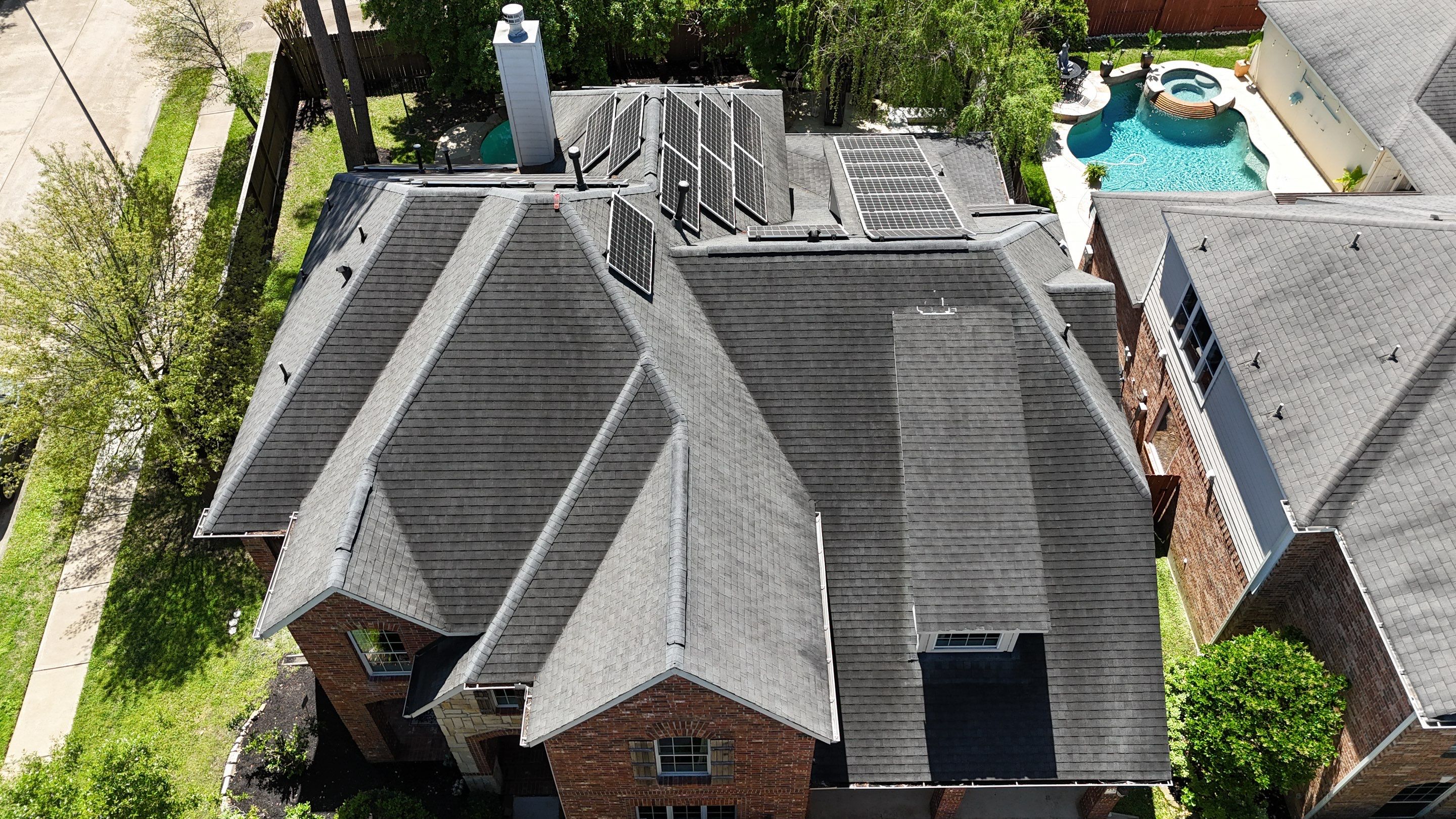 Residential Roofing Installation using Architectural Shingles by Core Four Roofing