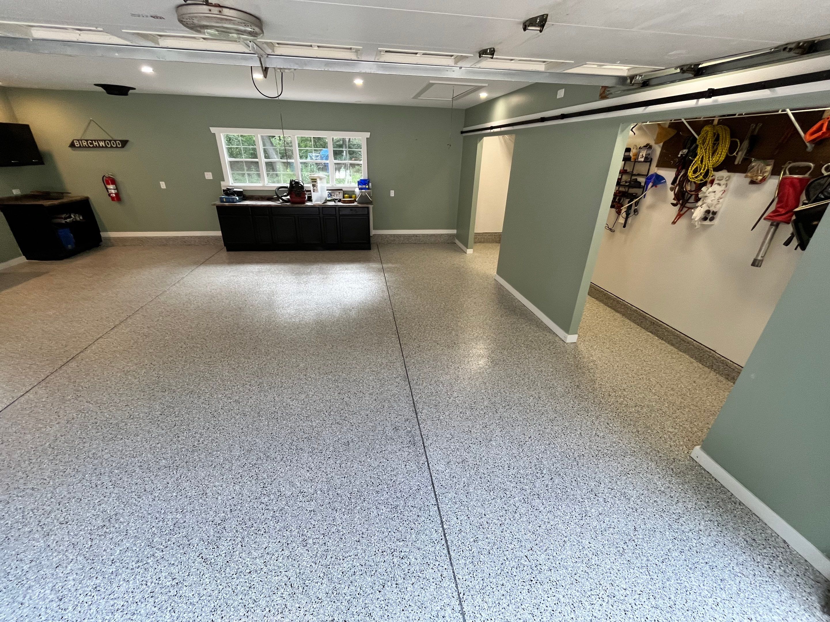 Cabin Fever Flake Garage Floor  by Level 10 Coatings