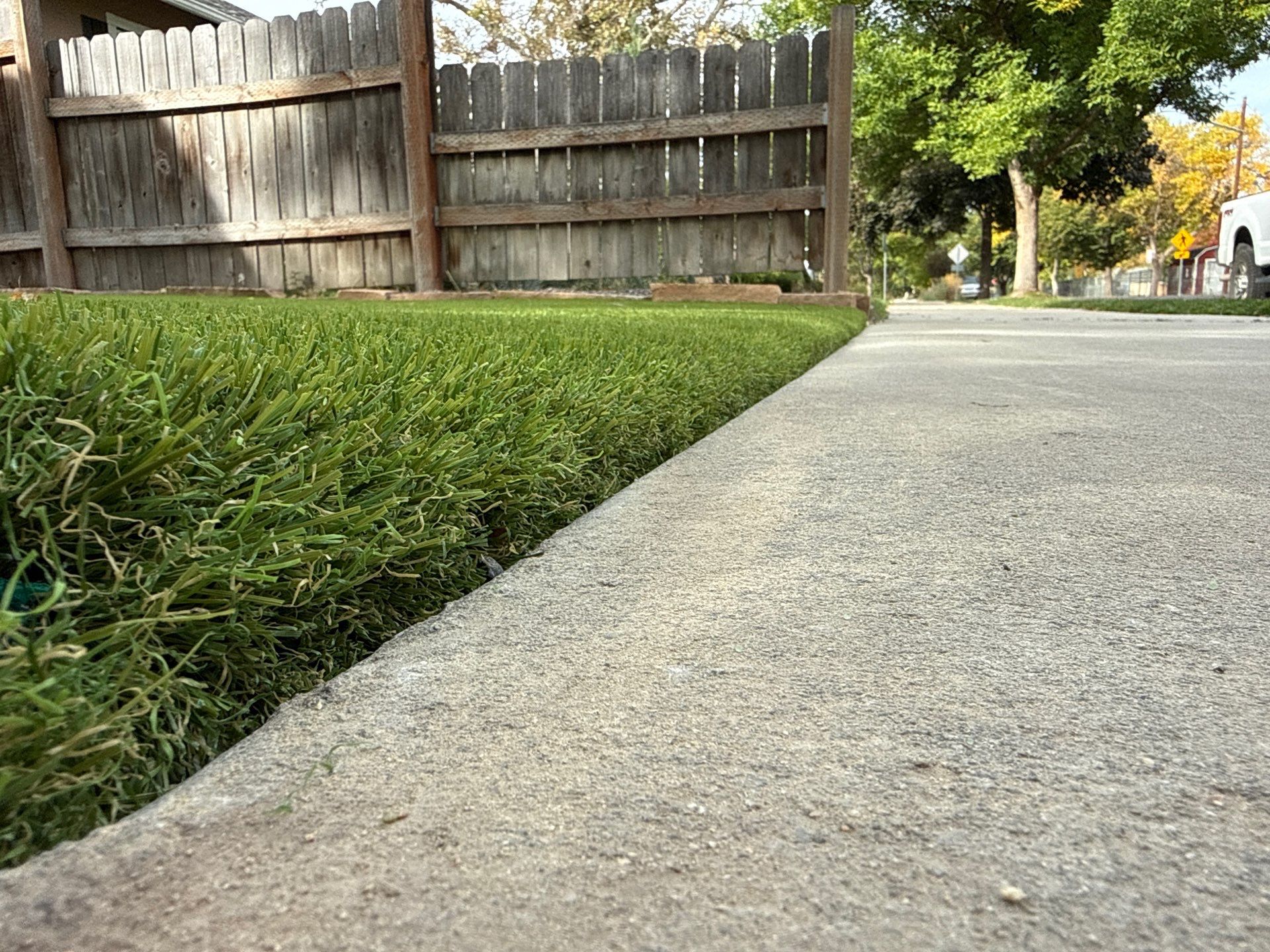 Boise Residential Landscape Renovation With Artificial Turf And Paver Walkways by Synlawn Idaho