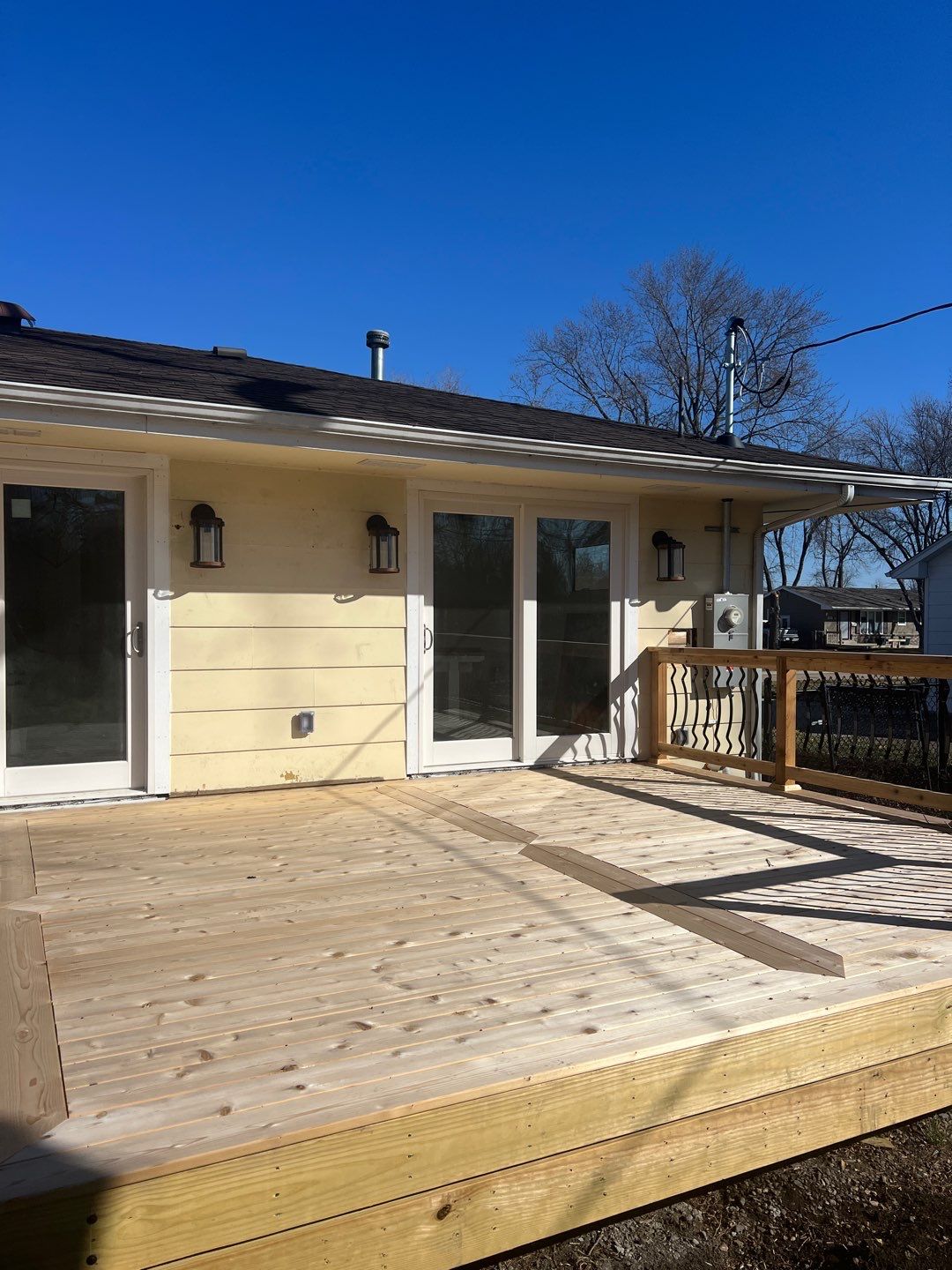 Deck re stained  by Cutting edge painting 