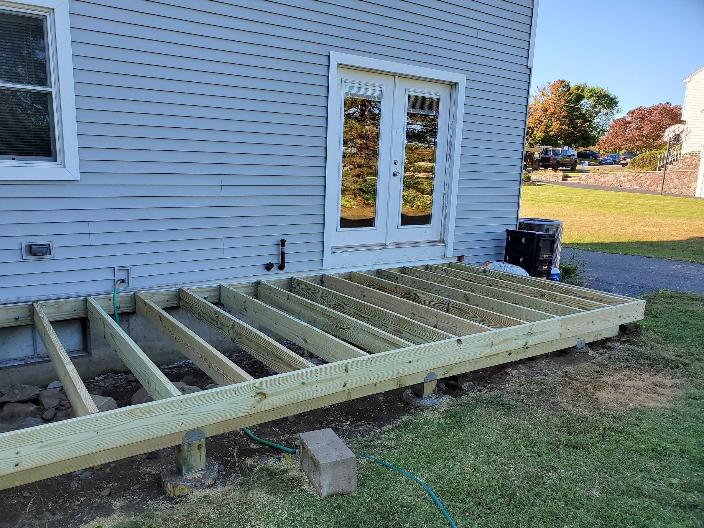 Porch/Deck Construction using PT Decking by UBrothers Construction